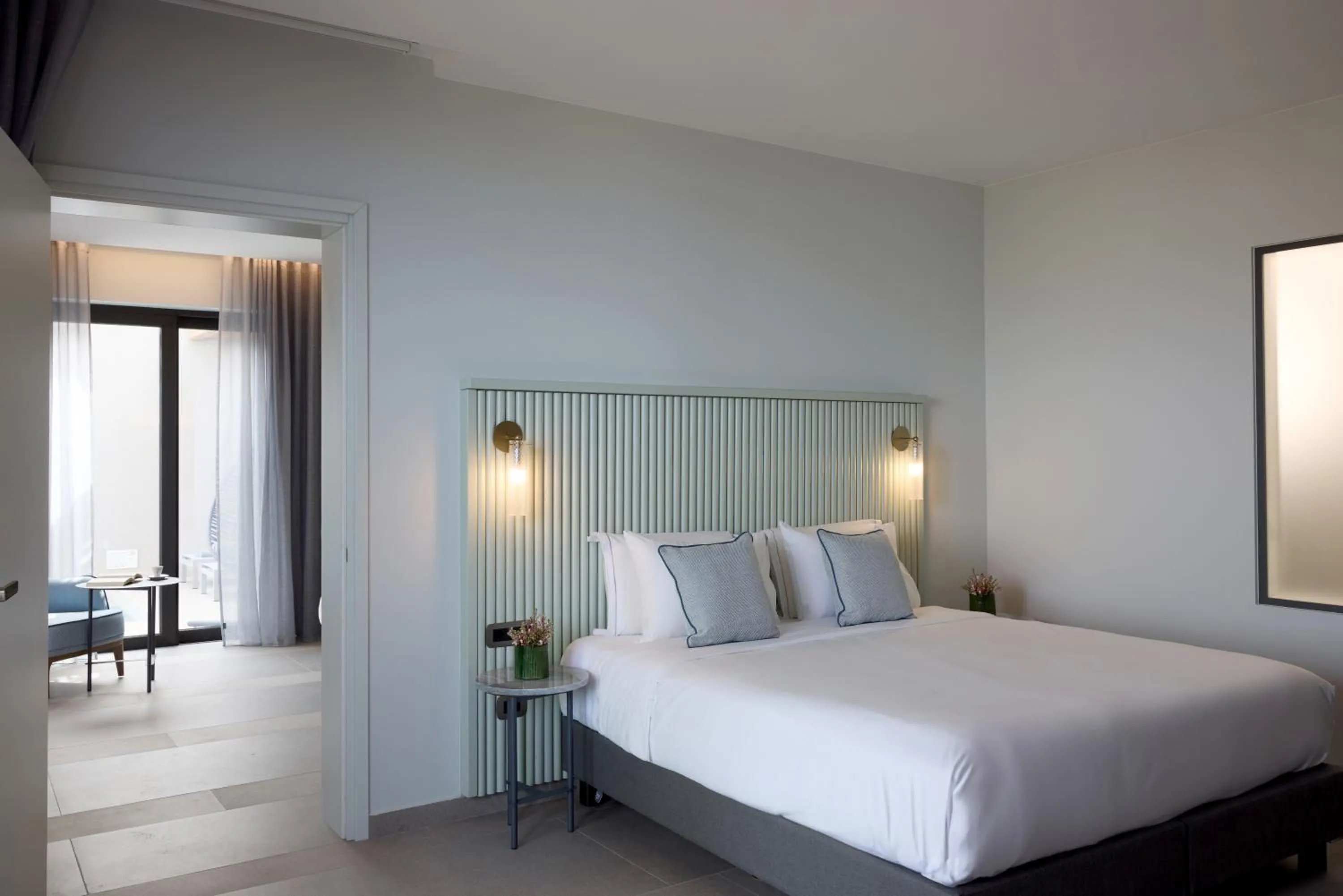 Bed in Cayo Exclusive Resort & Spa