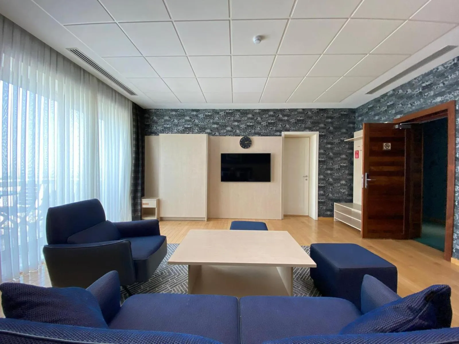 Communal lounge/ TV room in Badam d'Art Boutique Hotel