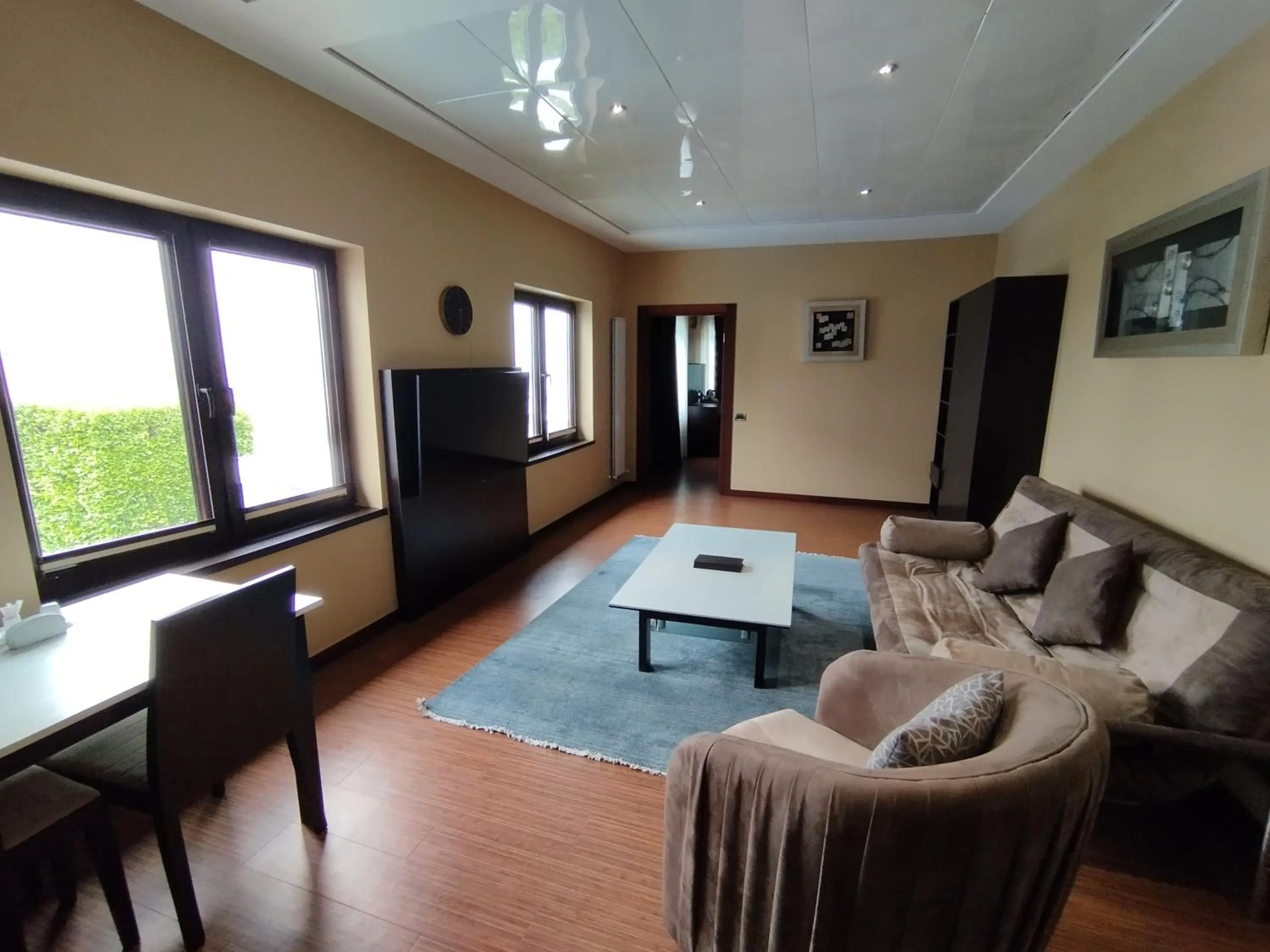 Communal lounge/ TV room in Badam d'Art Boutique Hotel