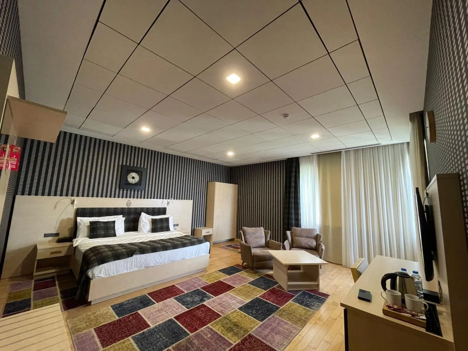 Photo of the whole room, Bed in Badam d'Art Boutique Hotel