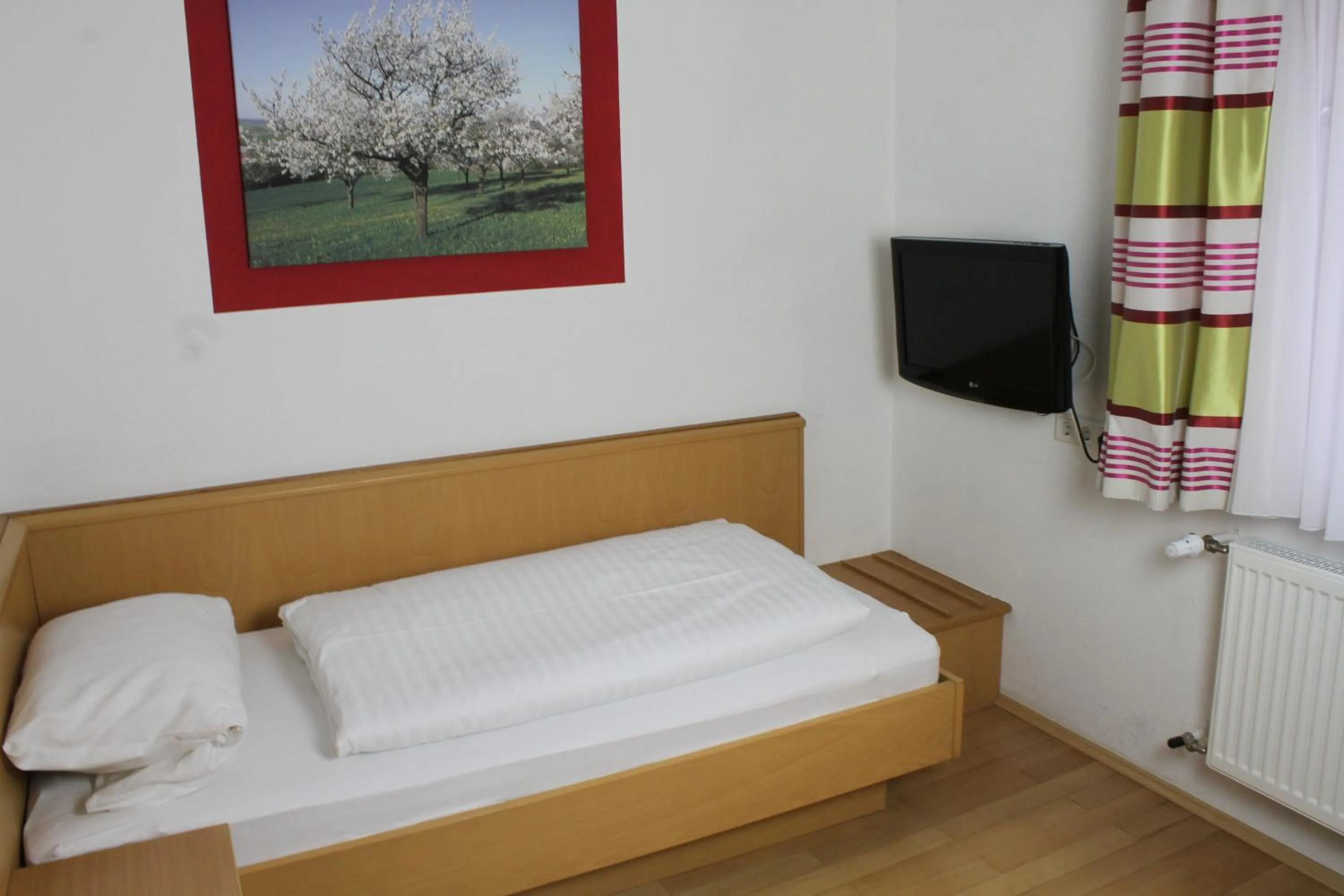 Photo of the whole room, Bed in Gasthof Pension Zum goldenen Hirschen