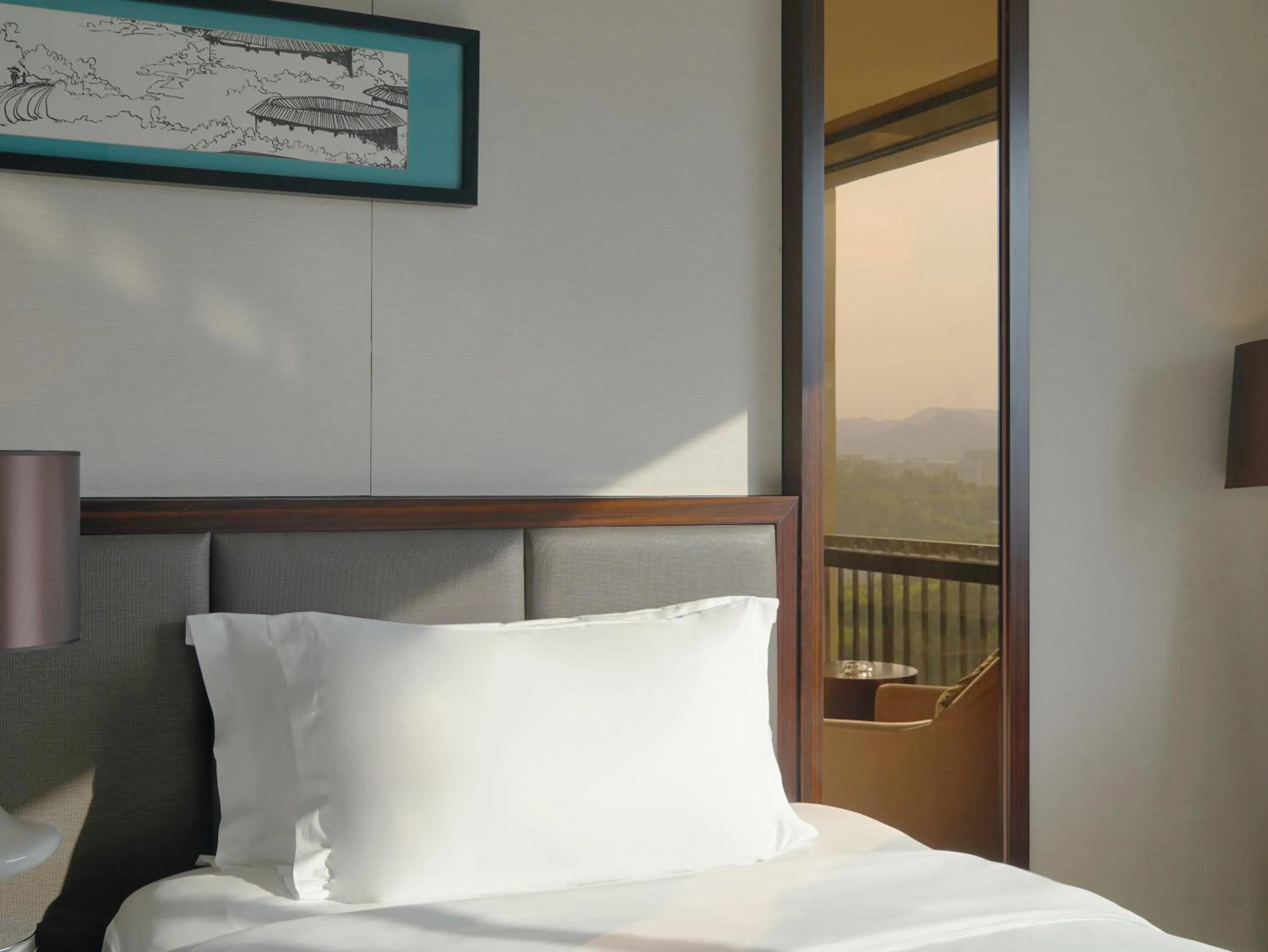 Bed in Howard Johnson Changsheng Plaza Meizhou