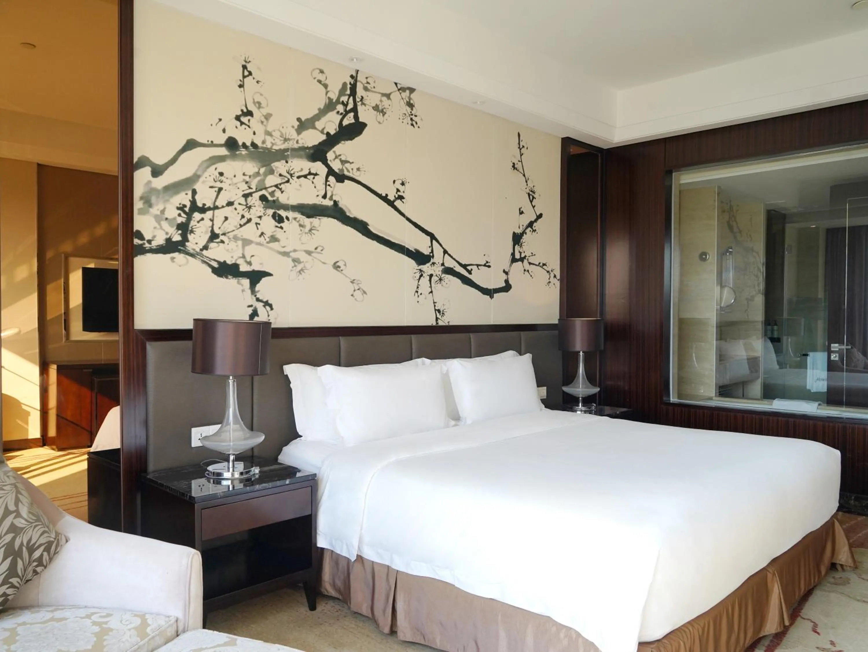 Bed in Howard Johnson Changsheng Plaza Meizhou