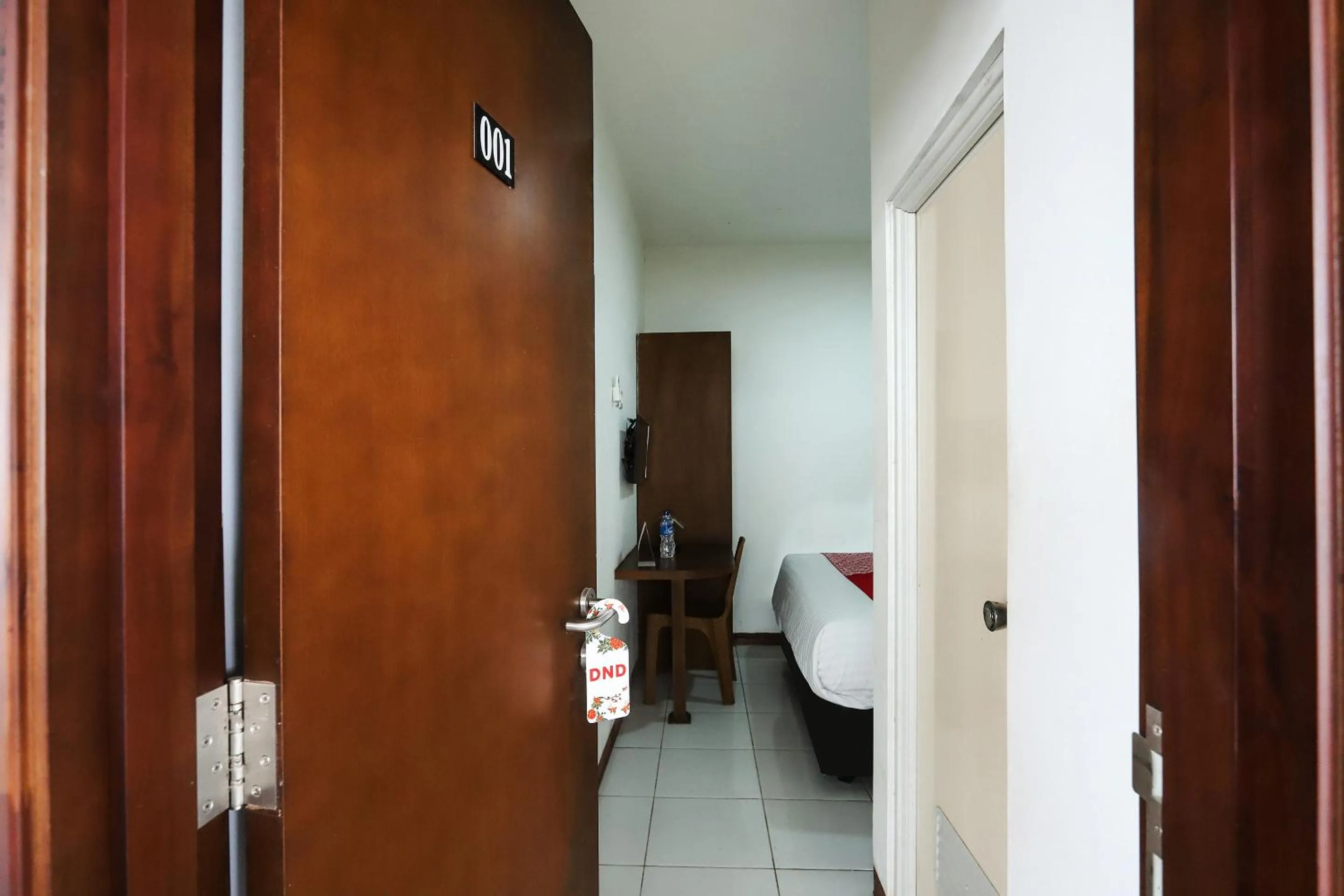 Bedroom in OYO 1582 Bungo Guest House