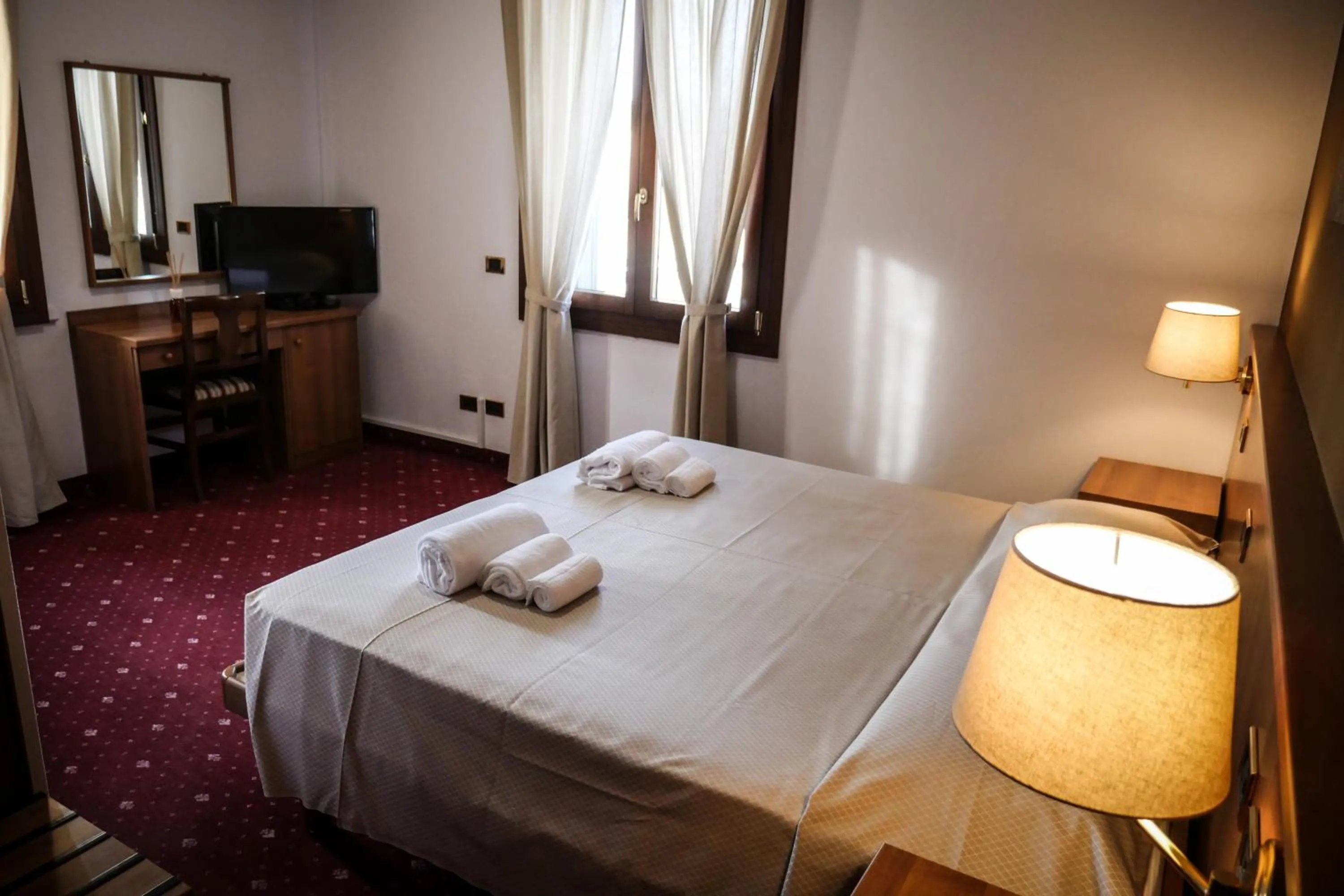 Bed in VILLANOVA HOTEL