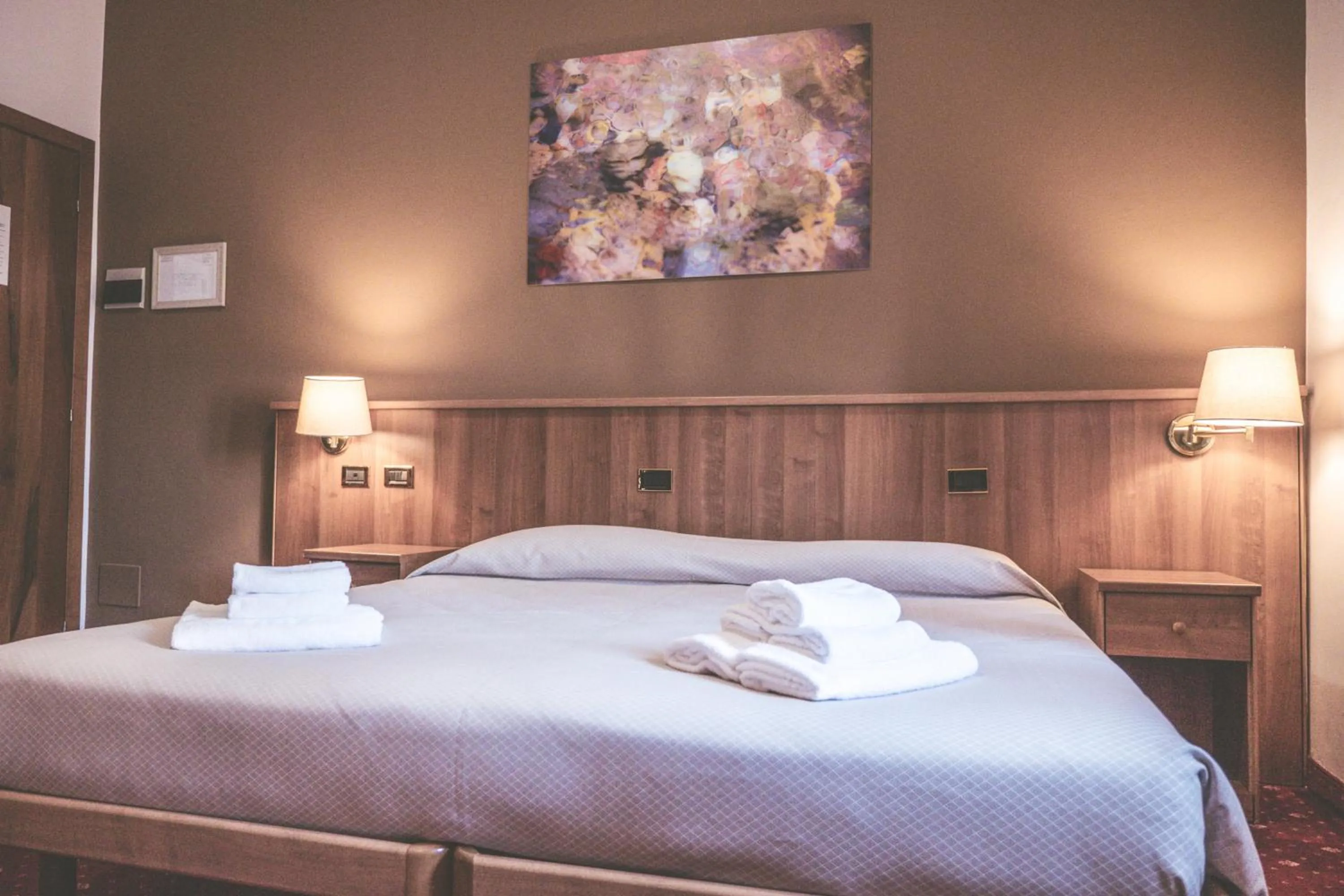 Bed in VILLANOVA HOTEL