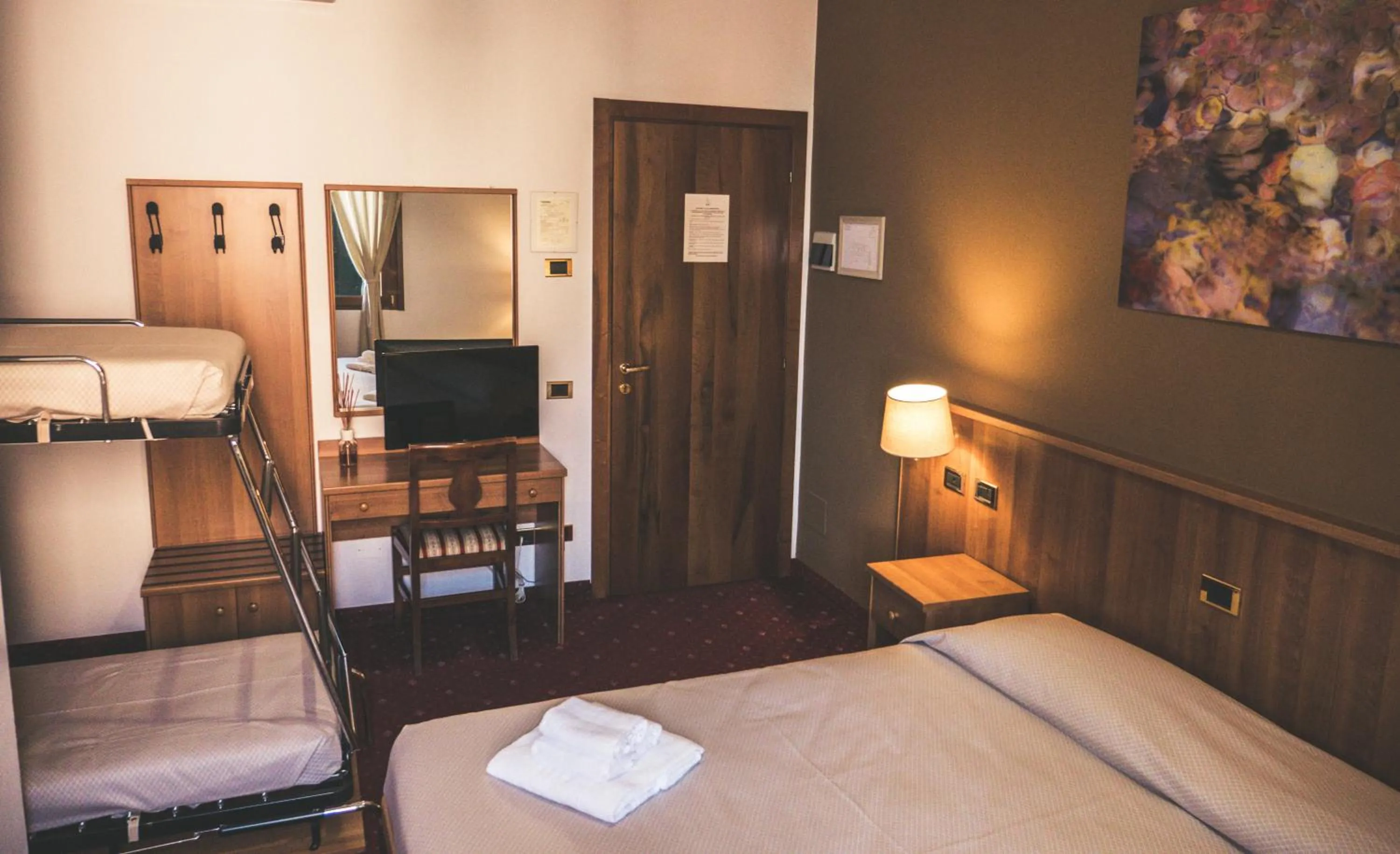 Bed in VILLANOVA HOTEL