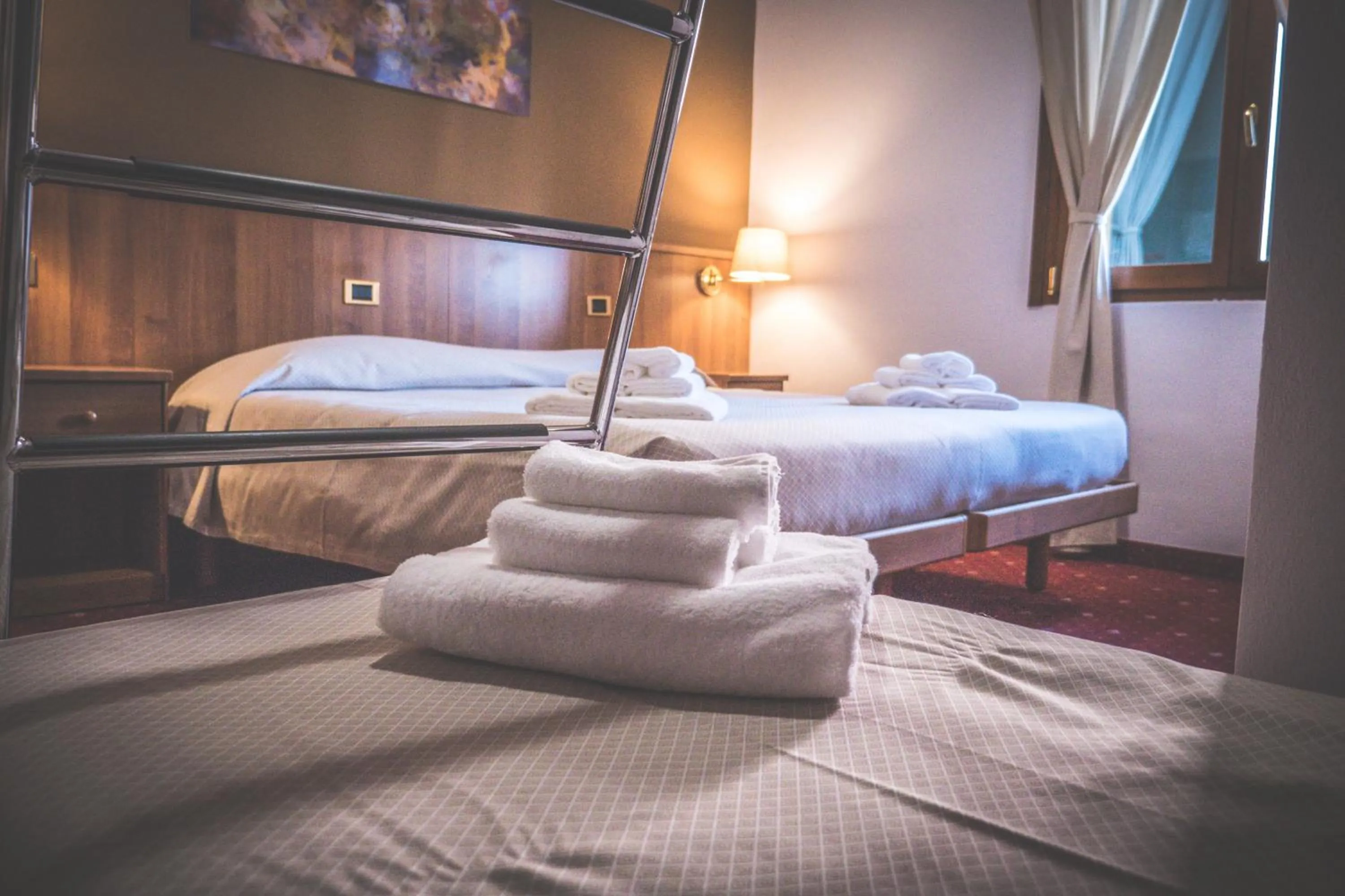 Bed in VILLANOVA HOTEL