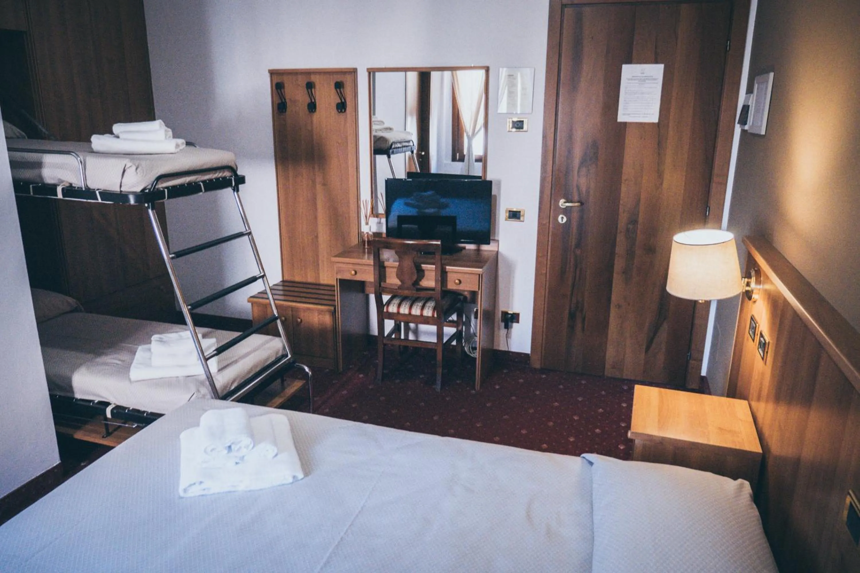 Bed in VILLANOVA HOTEL