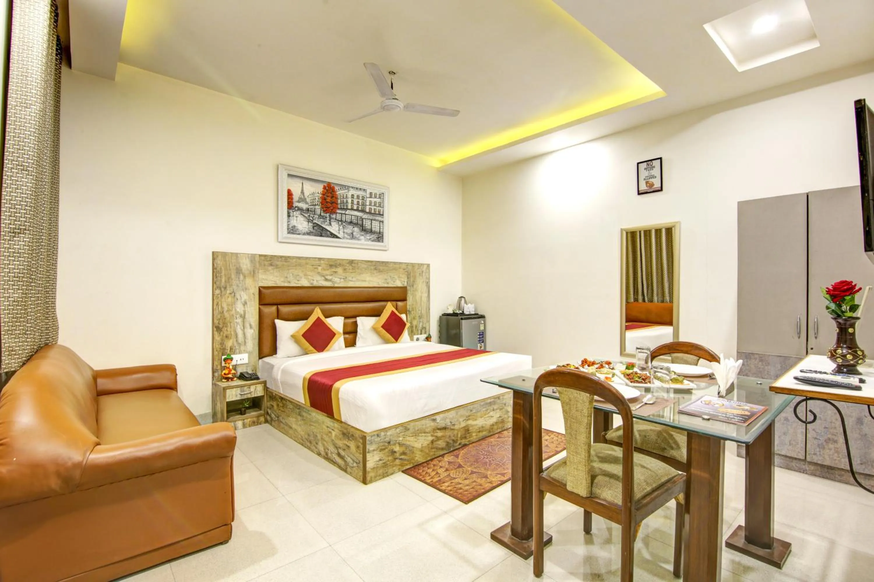 Dining area, Bed in Gracious by Vishesh Hotels & Home Stay