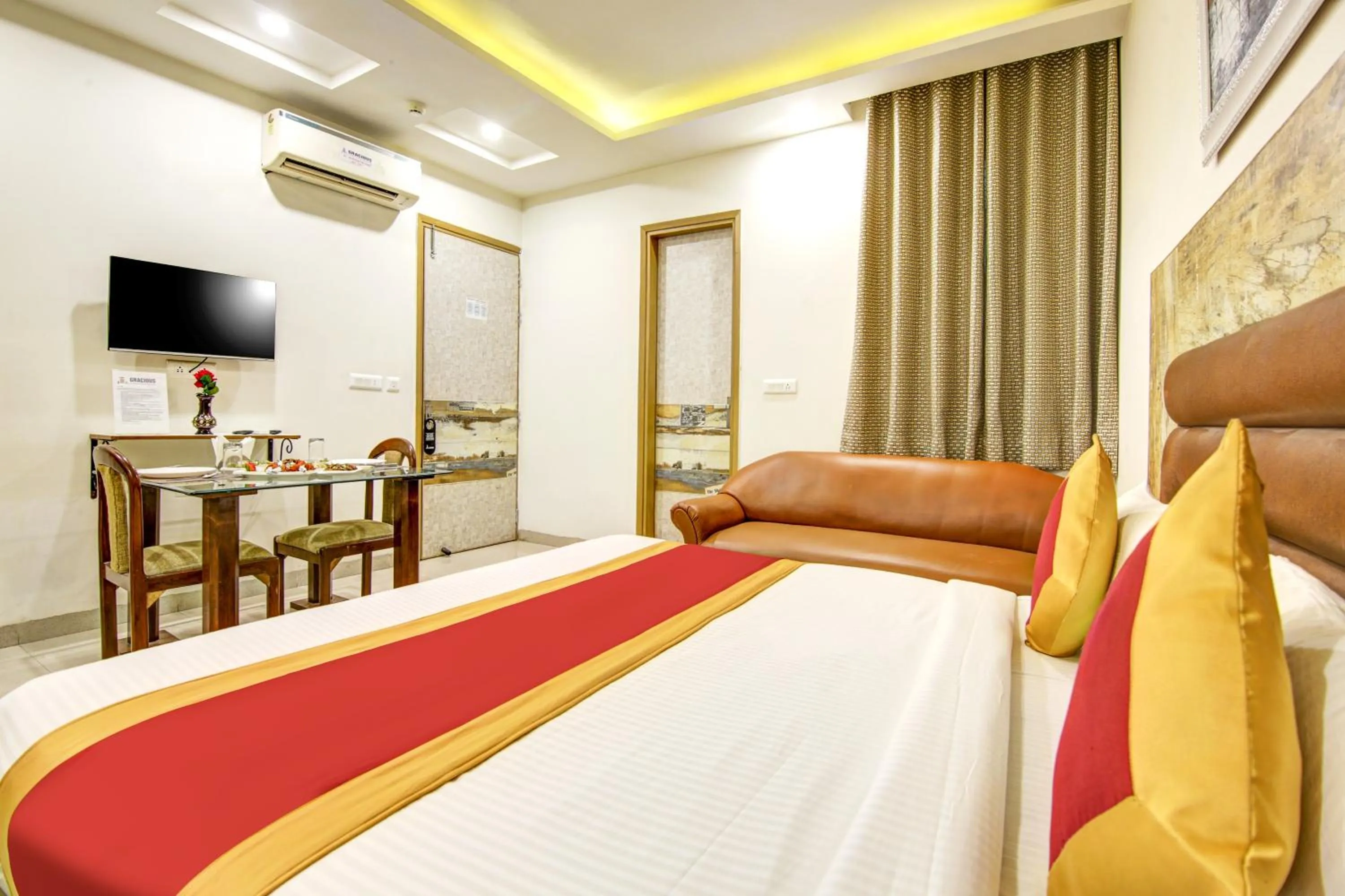 Bedroom, Bed in Gracious by Vishesh Hotels & Home Stay