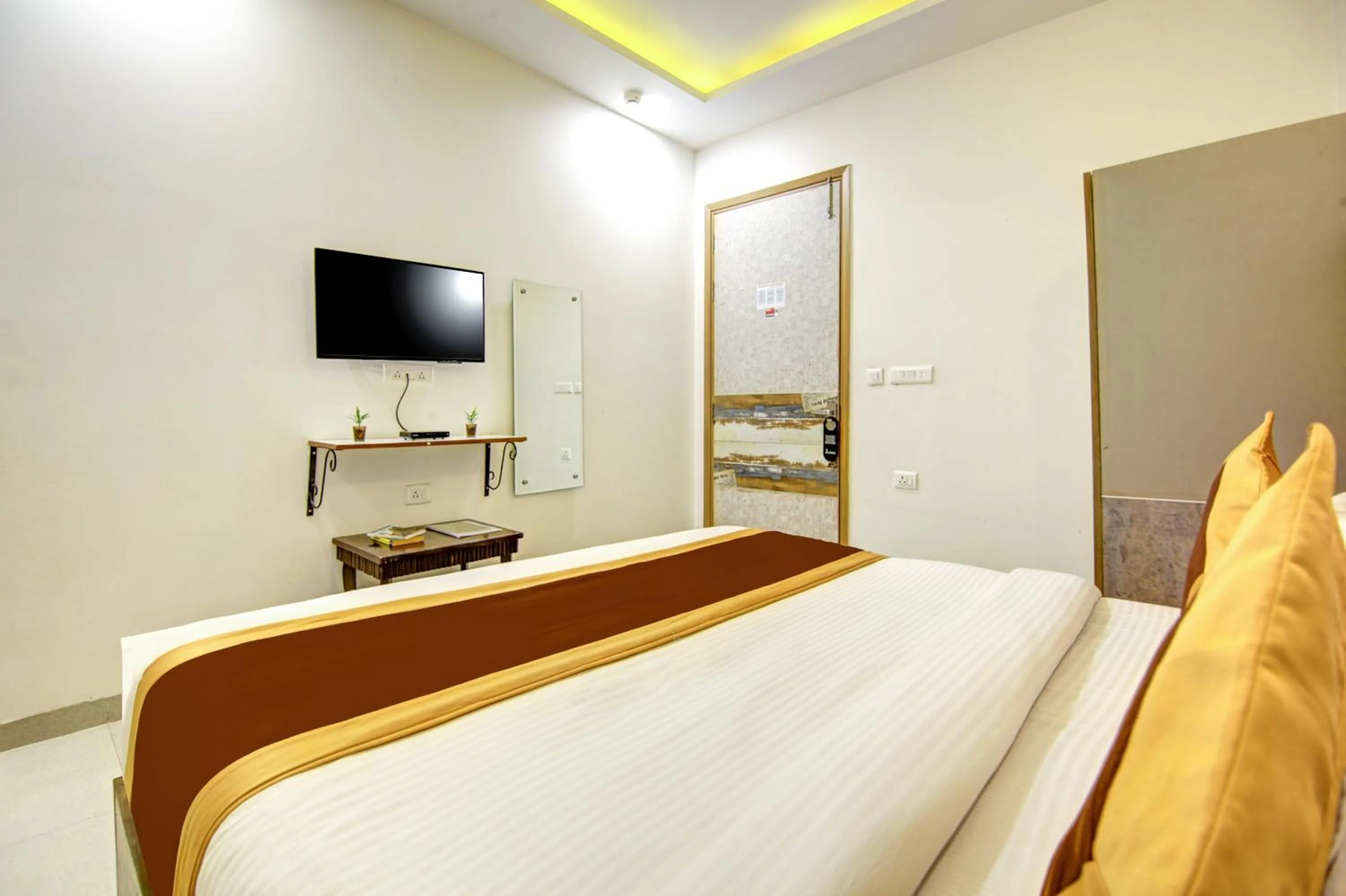 Bedroom, Bed in Gracious by Vishesh Hotels & Home Stay