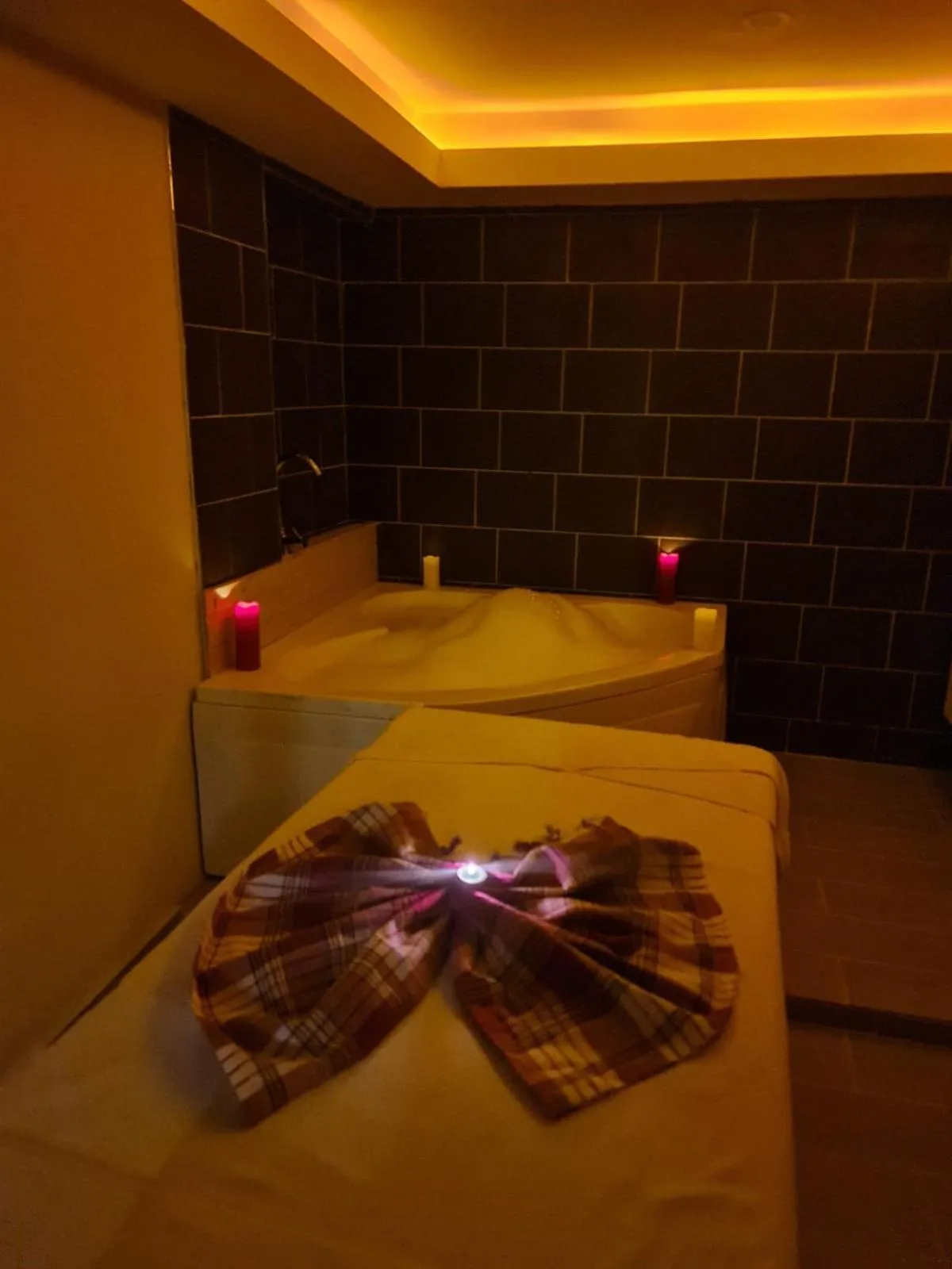 Bed in Olivia Palm Hotel