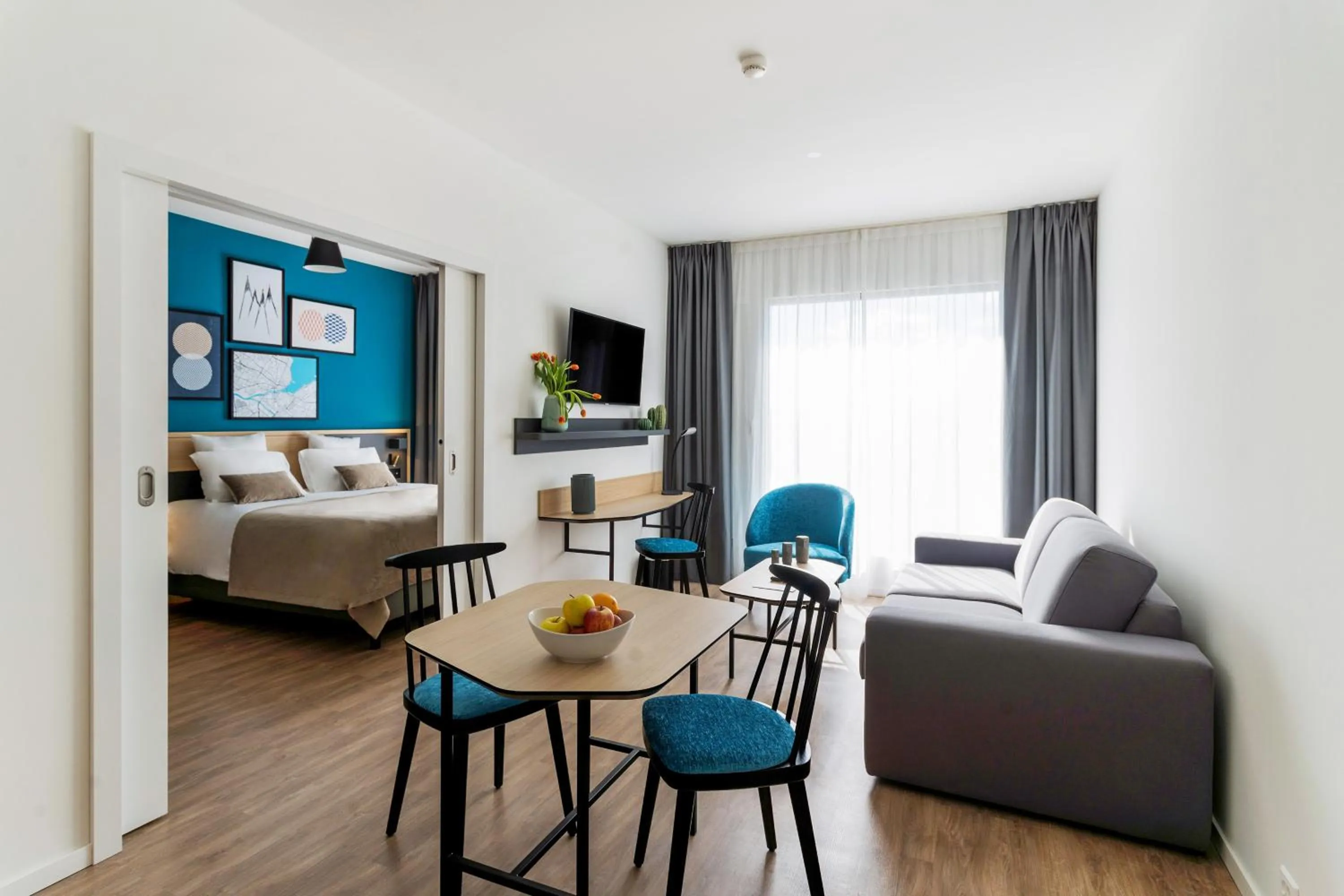 Living room, Bed in Appart'City Collection Genève Aéroport - Vernier