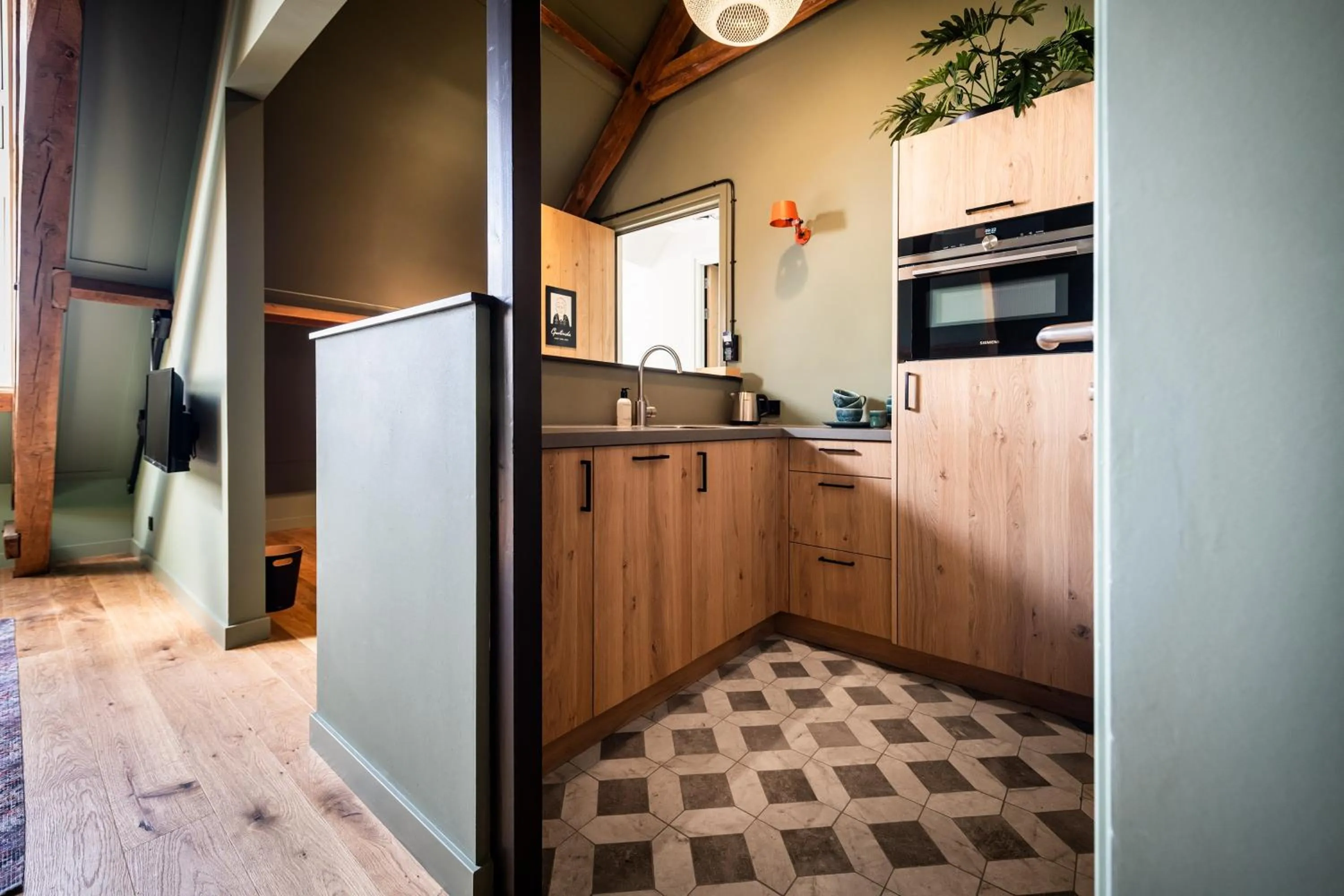 Kitchen or kitchenette in Boutique Hotel De Beerze