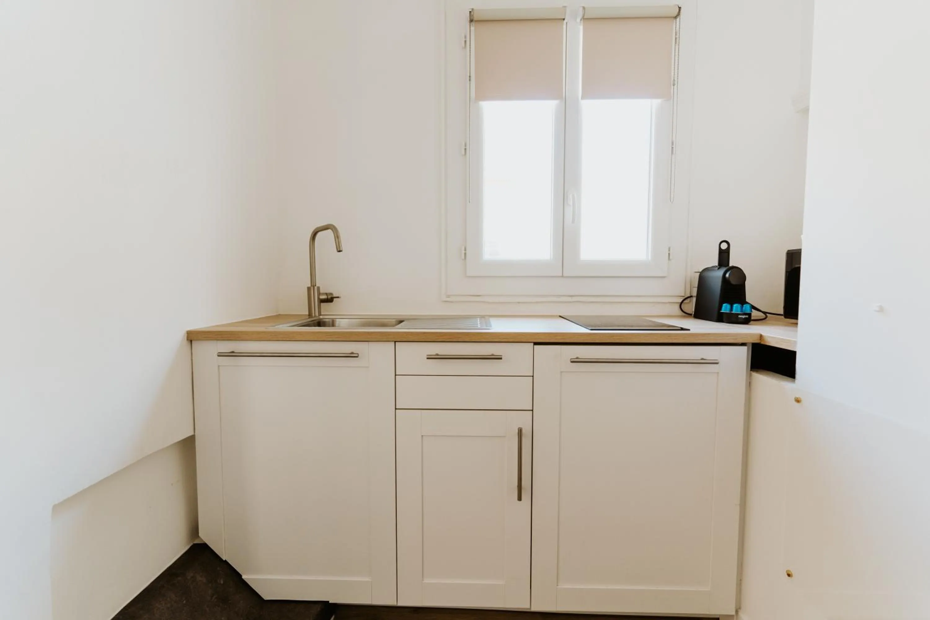 Kitchen or kitchenette in Palm Boutique Hôtel Nice