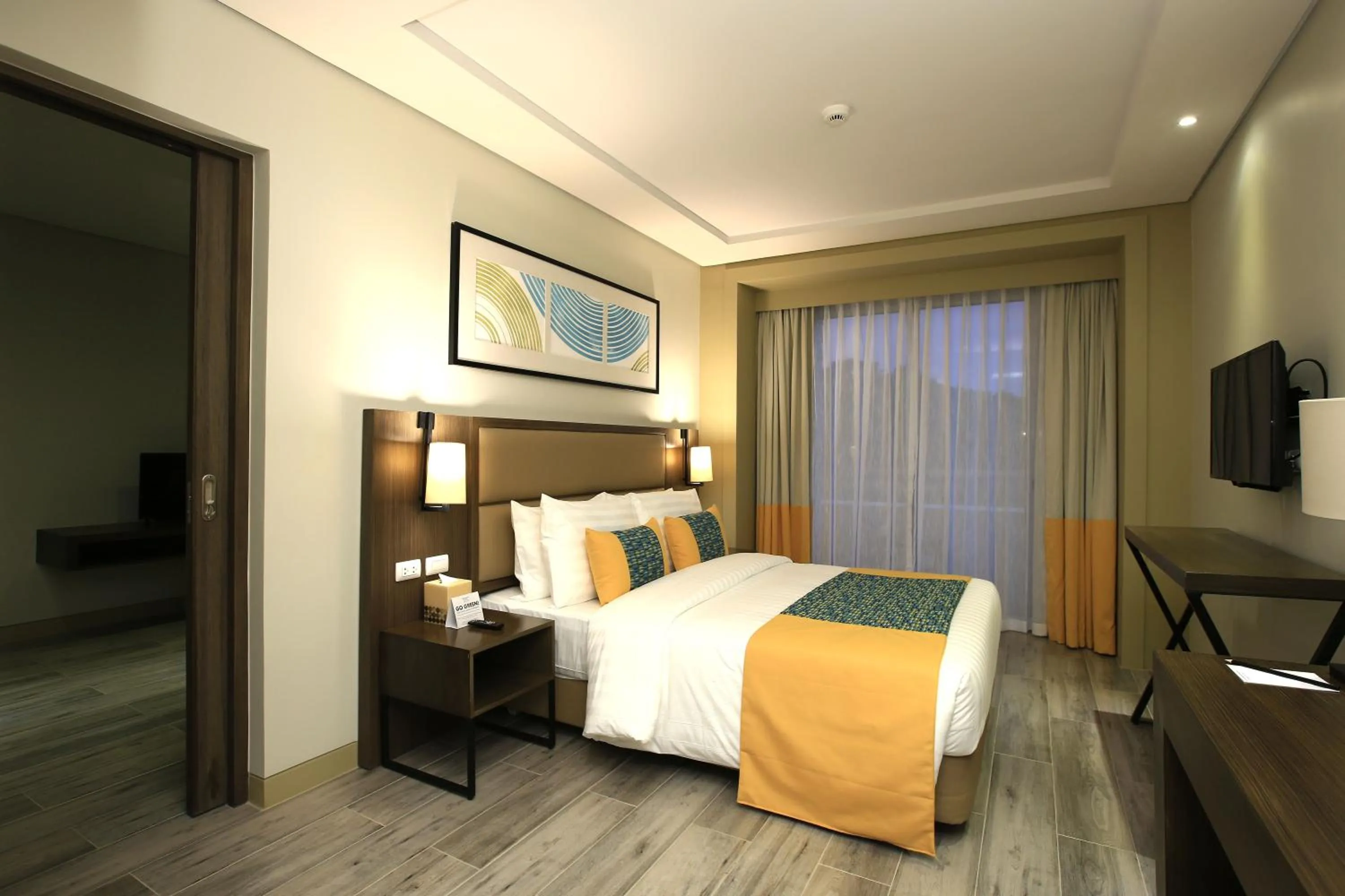 Photo of the whole room, Bed in Belmont Hotel Boracay near Newcoast Beach