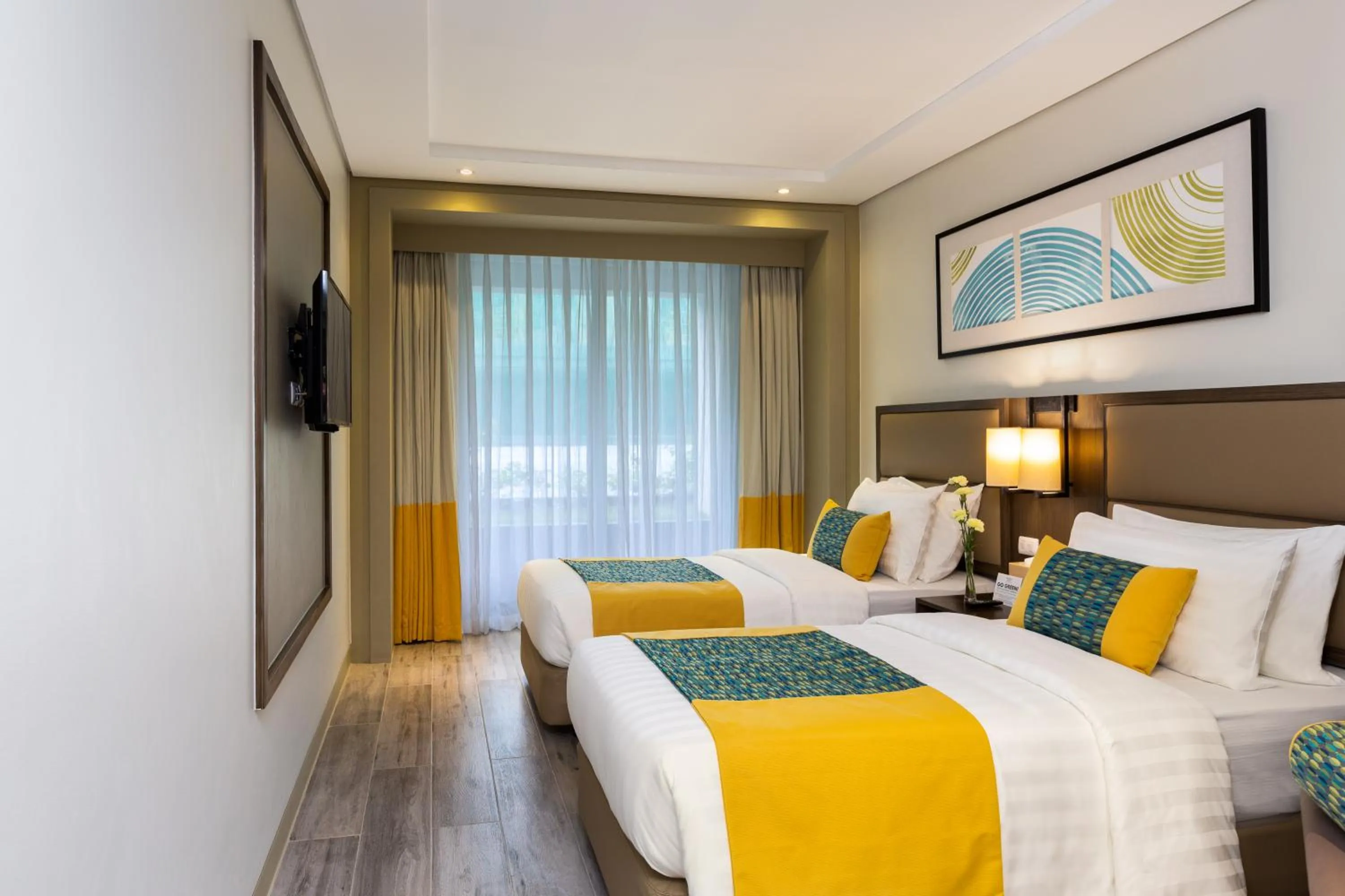 Photo of the whole room, Bed in Belmont Hotel Boracay near Newcoast Beach