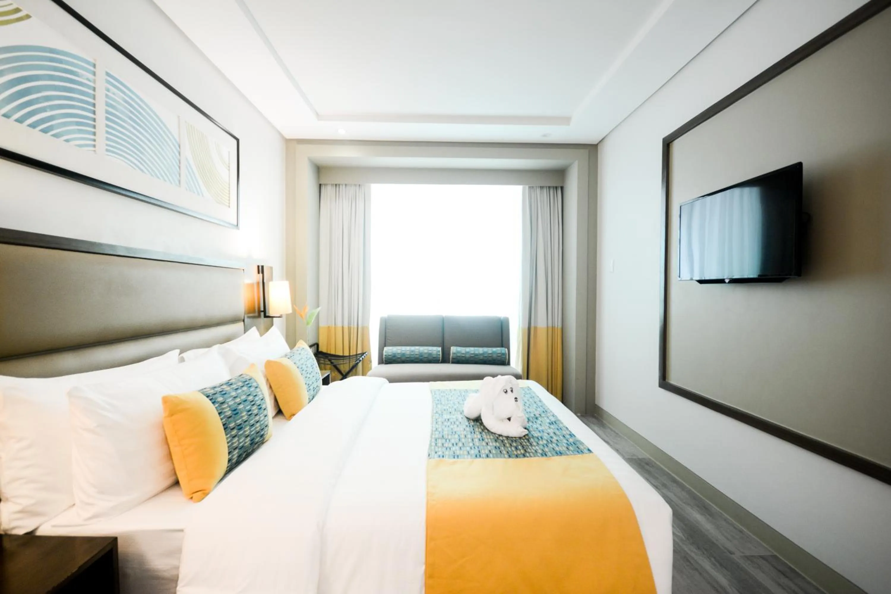 Photo of the whole room, Bed in Belmont Hotel Boracay near Newcoast Beach