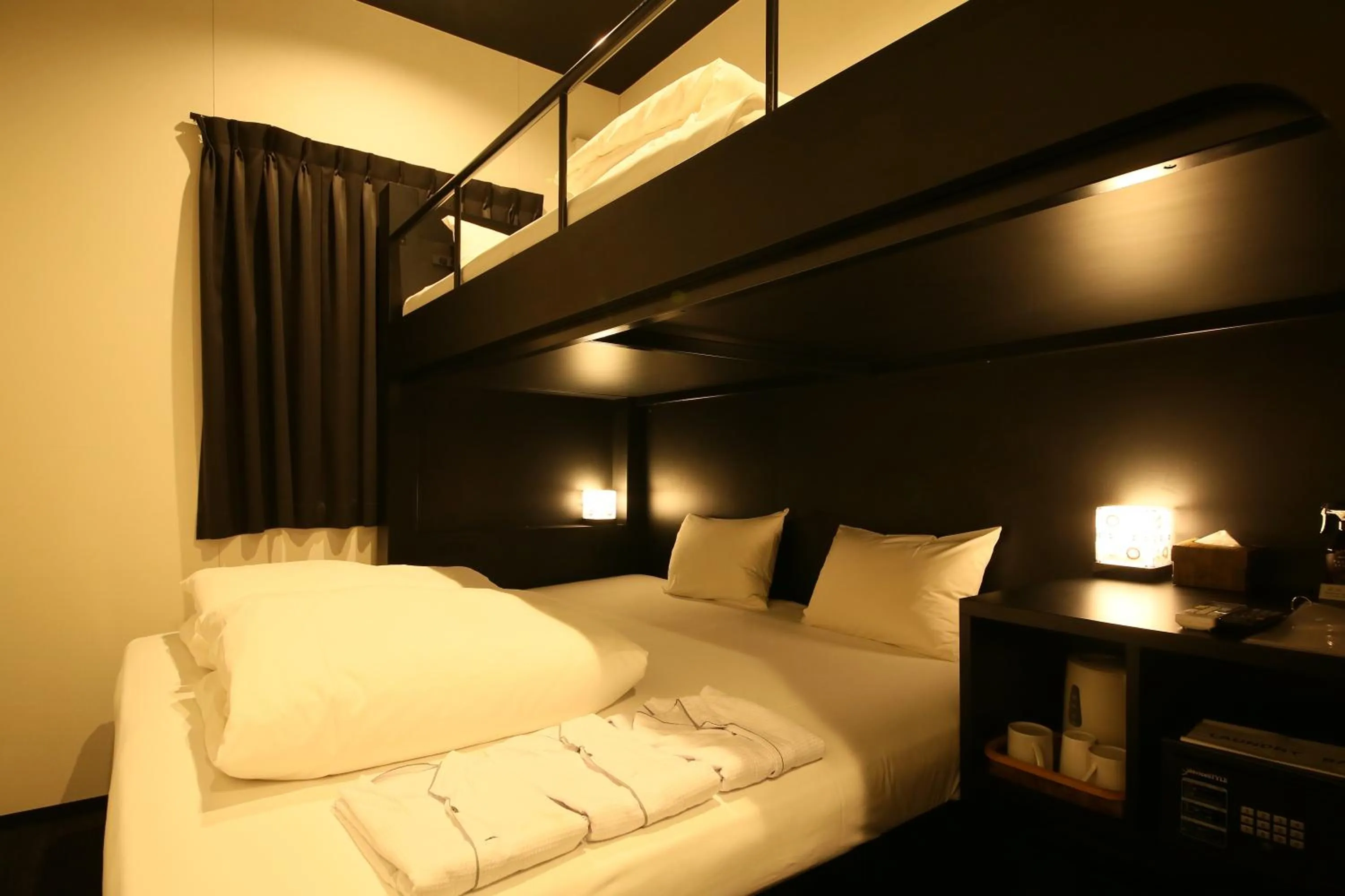 Bed in HOTEL TRAD Replay