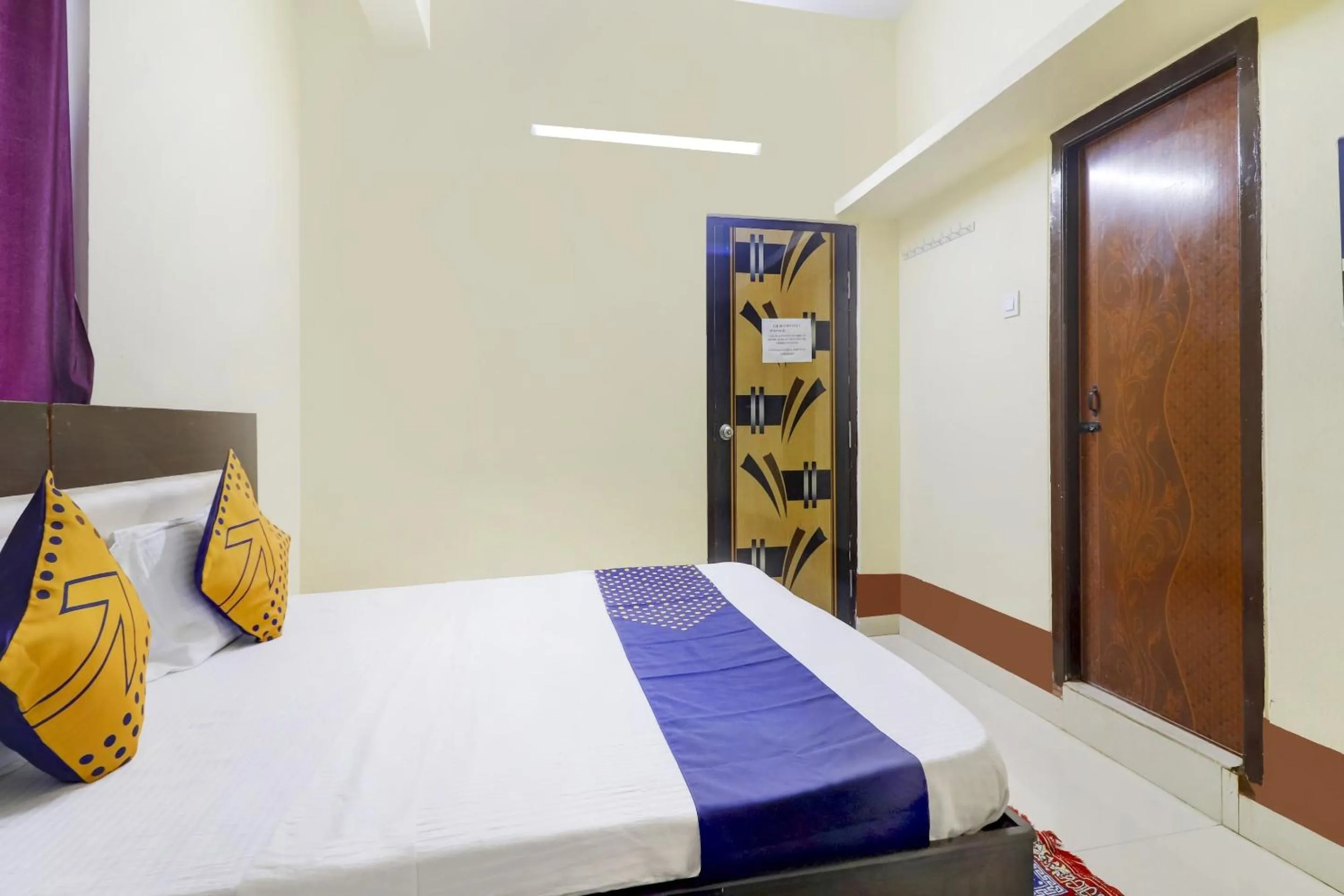 Bedroom, Bed in Hotel O Srinidhi Inn