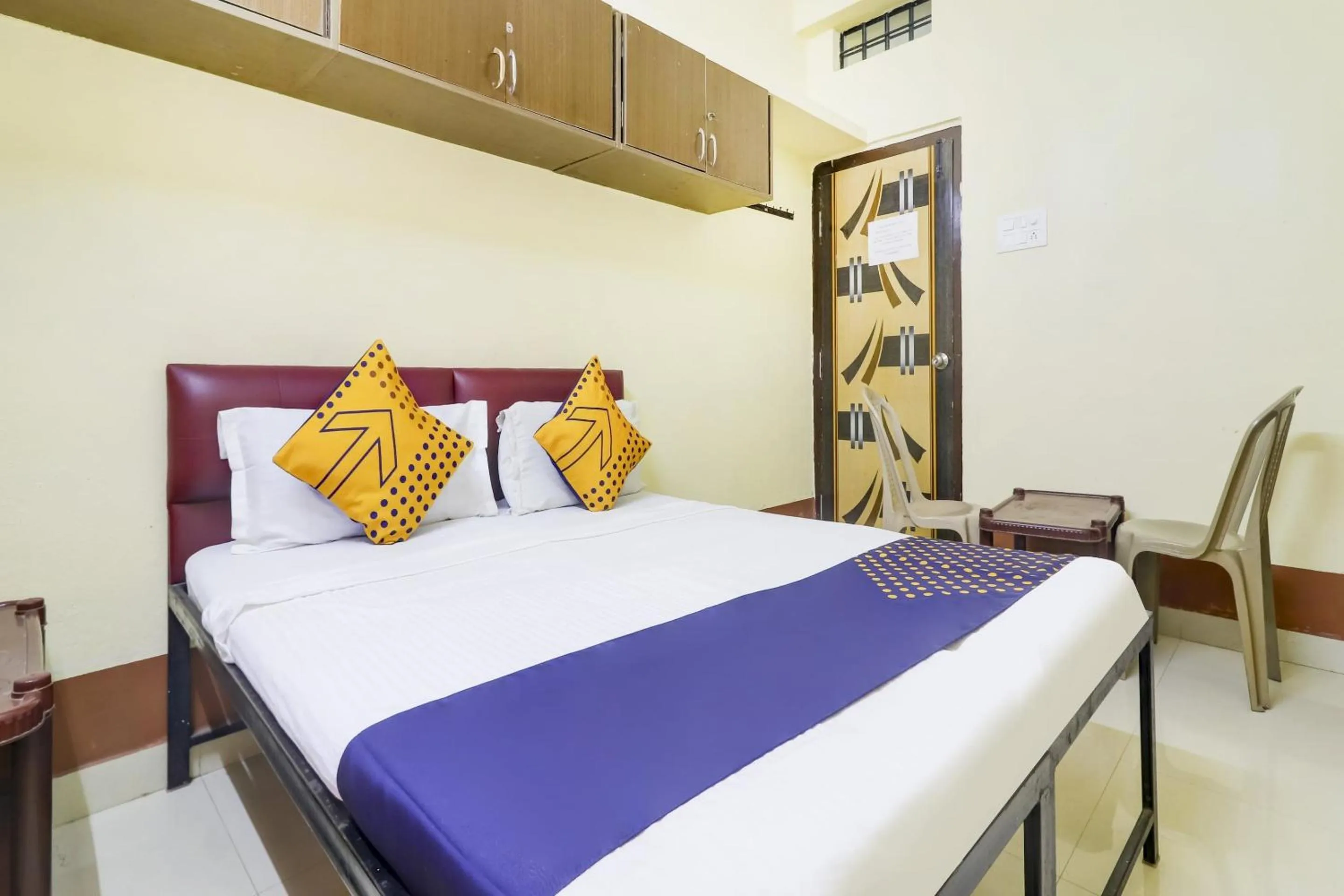 Bedroom, Bed in Hotel O Srinidhi Inn