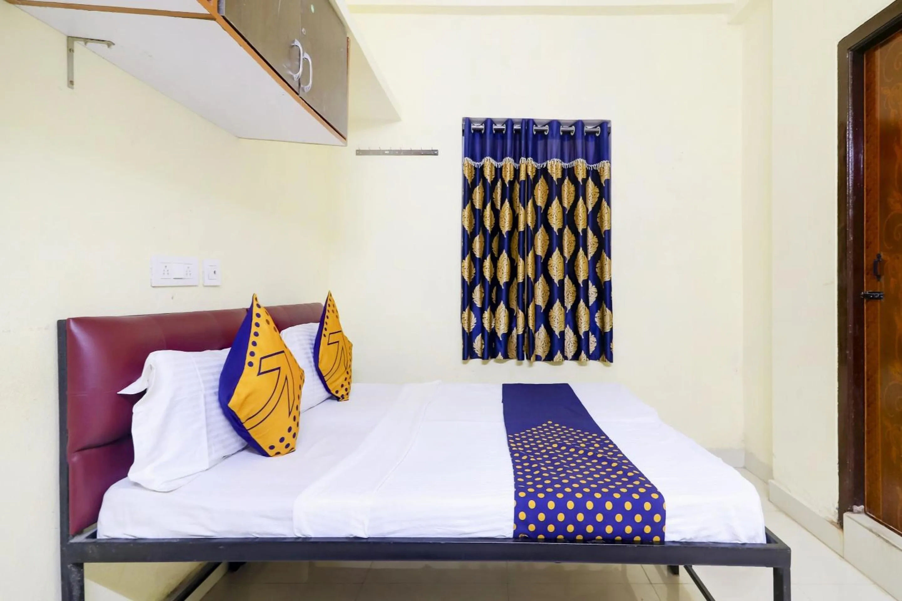 Bedroom, Bed in Hotel O Srinidhi Inn