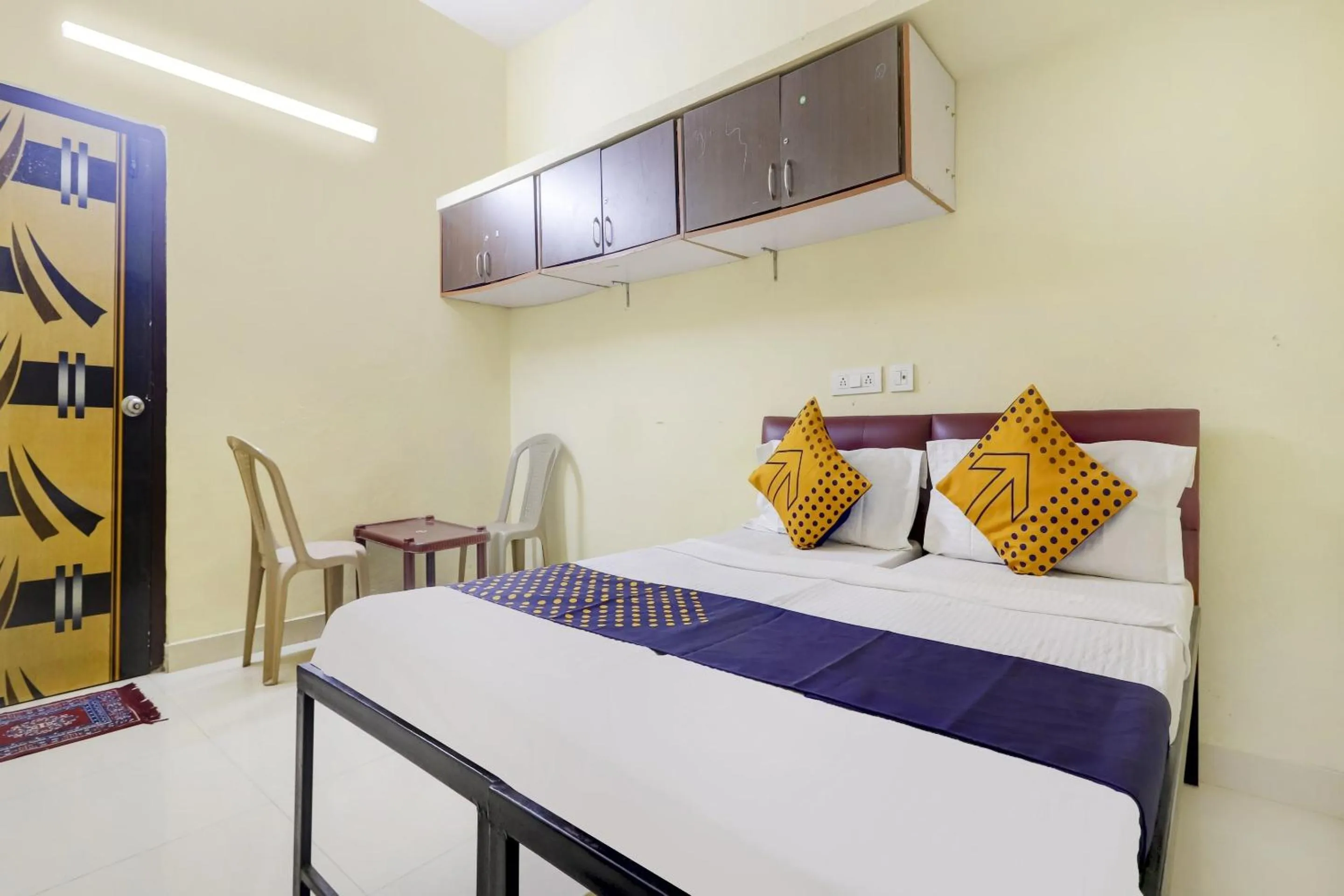 Bedroom, Bed in Hotel O Srinidhi Inn