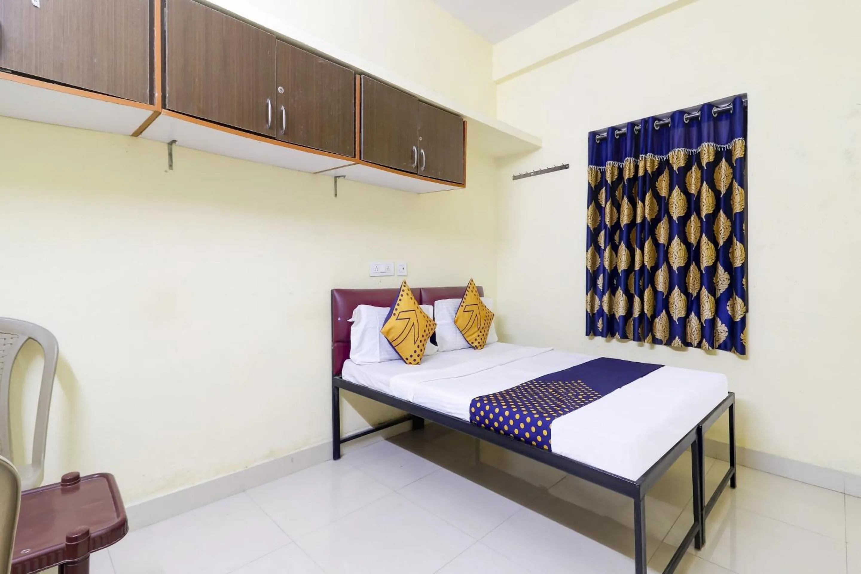 Bedroom, Bed in Hotel O Srinidhi Inn