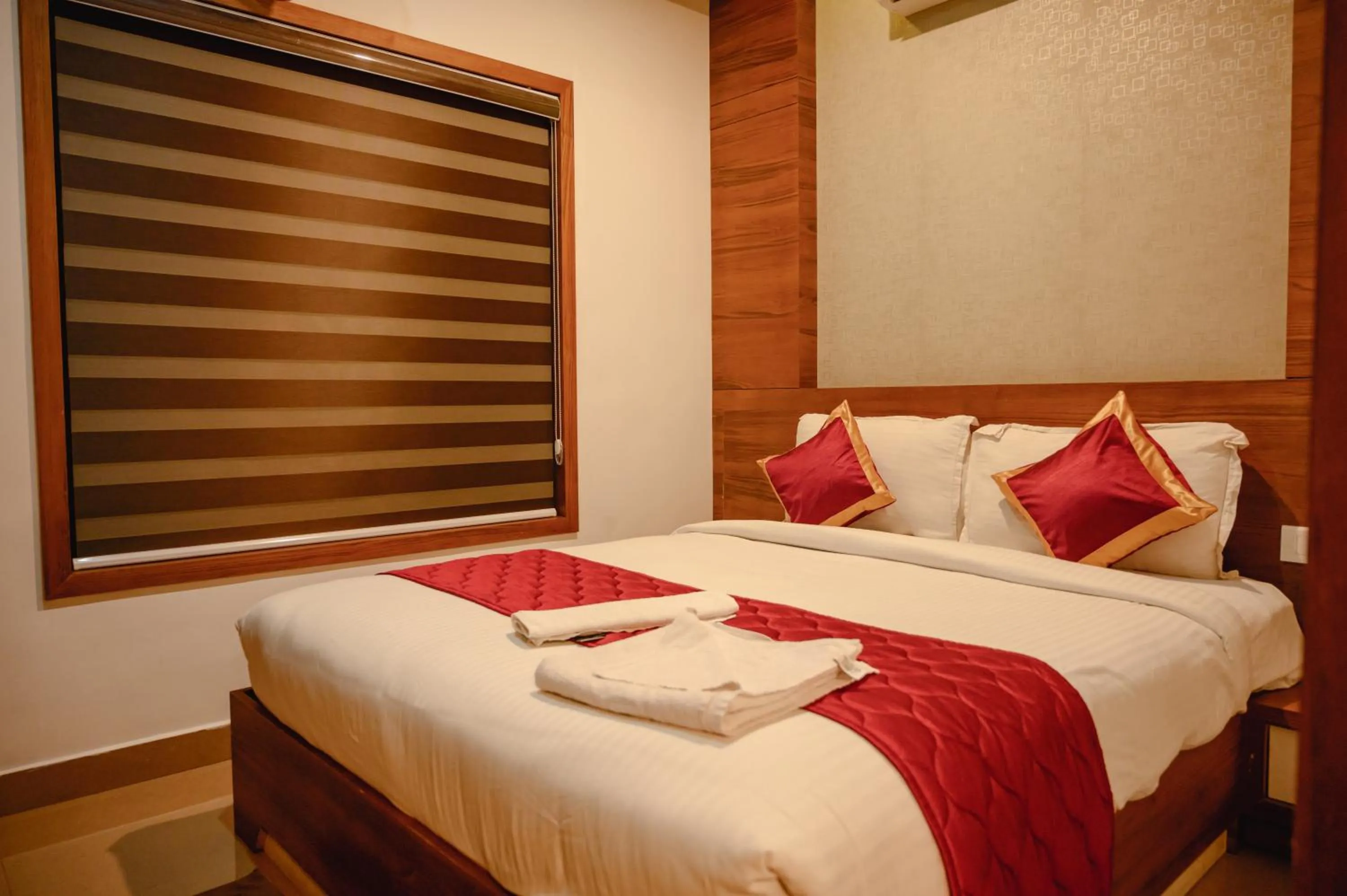 Bed in Royal Plaza Wayanad