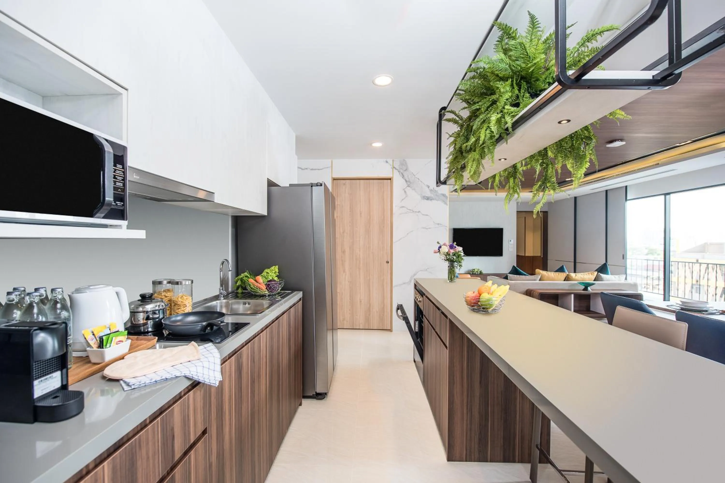 Kitchen or kitchenette in Amanta Hotel & Residence Sathorn