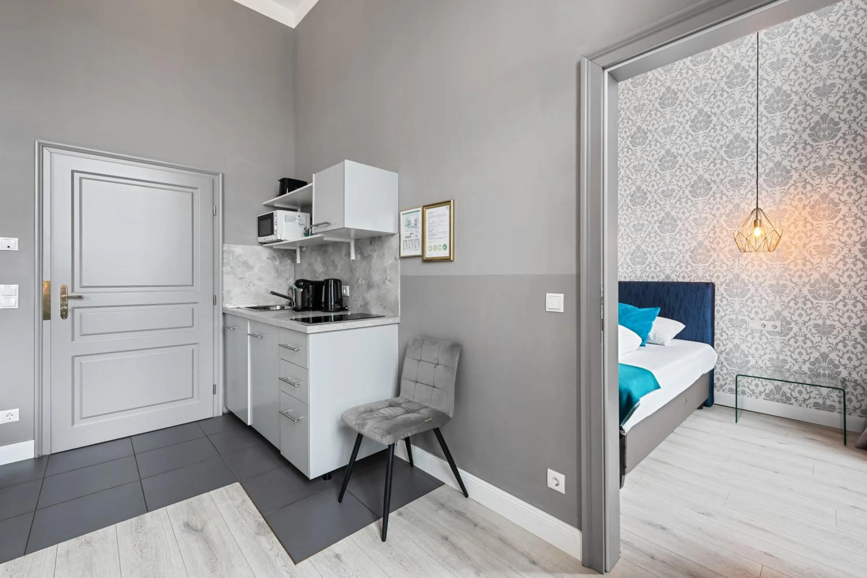 kitchen, Bed in KH Opera Apartments