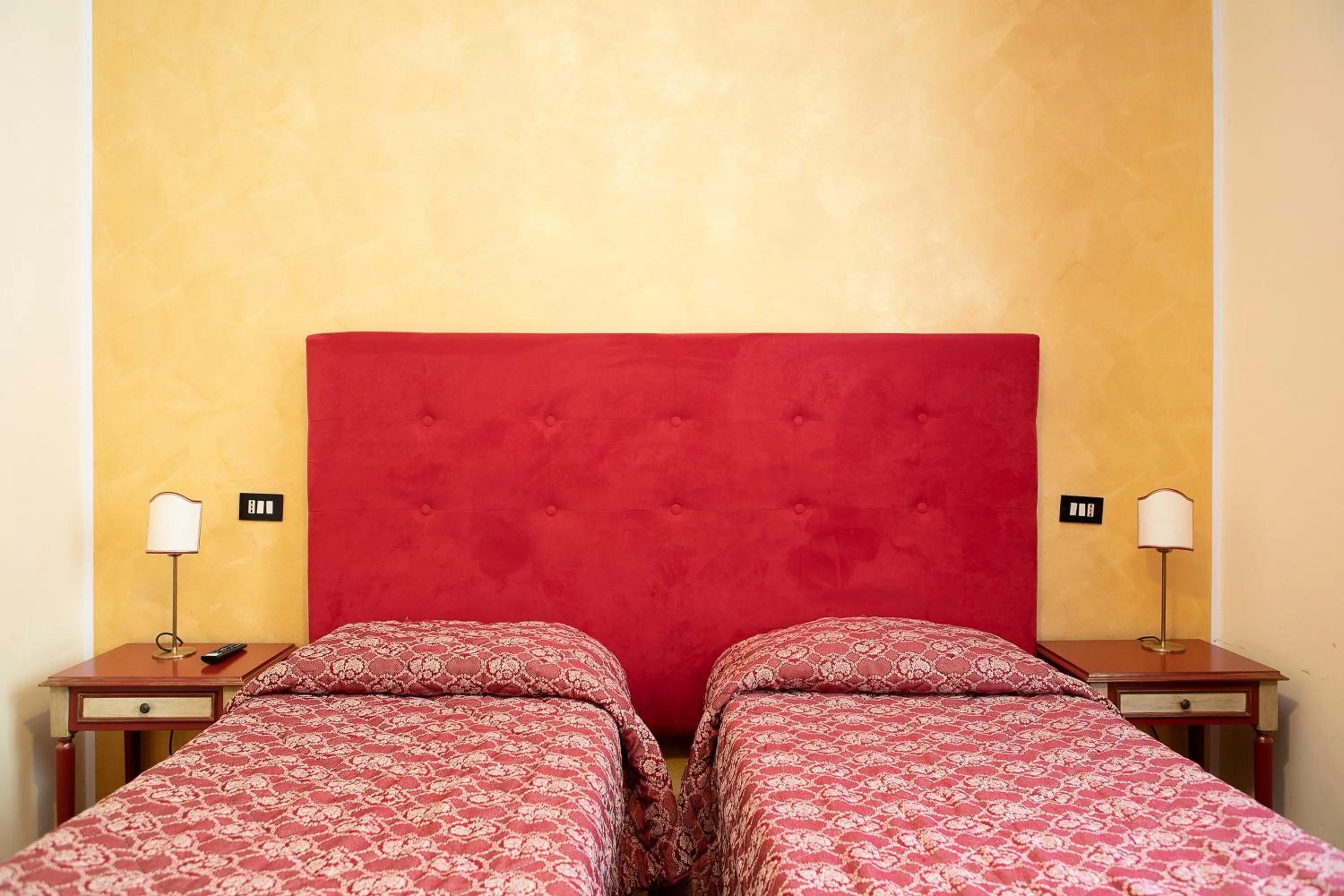 Bed in Hotel Fiordigigli