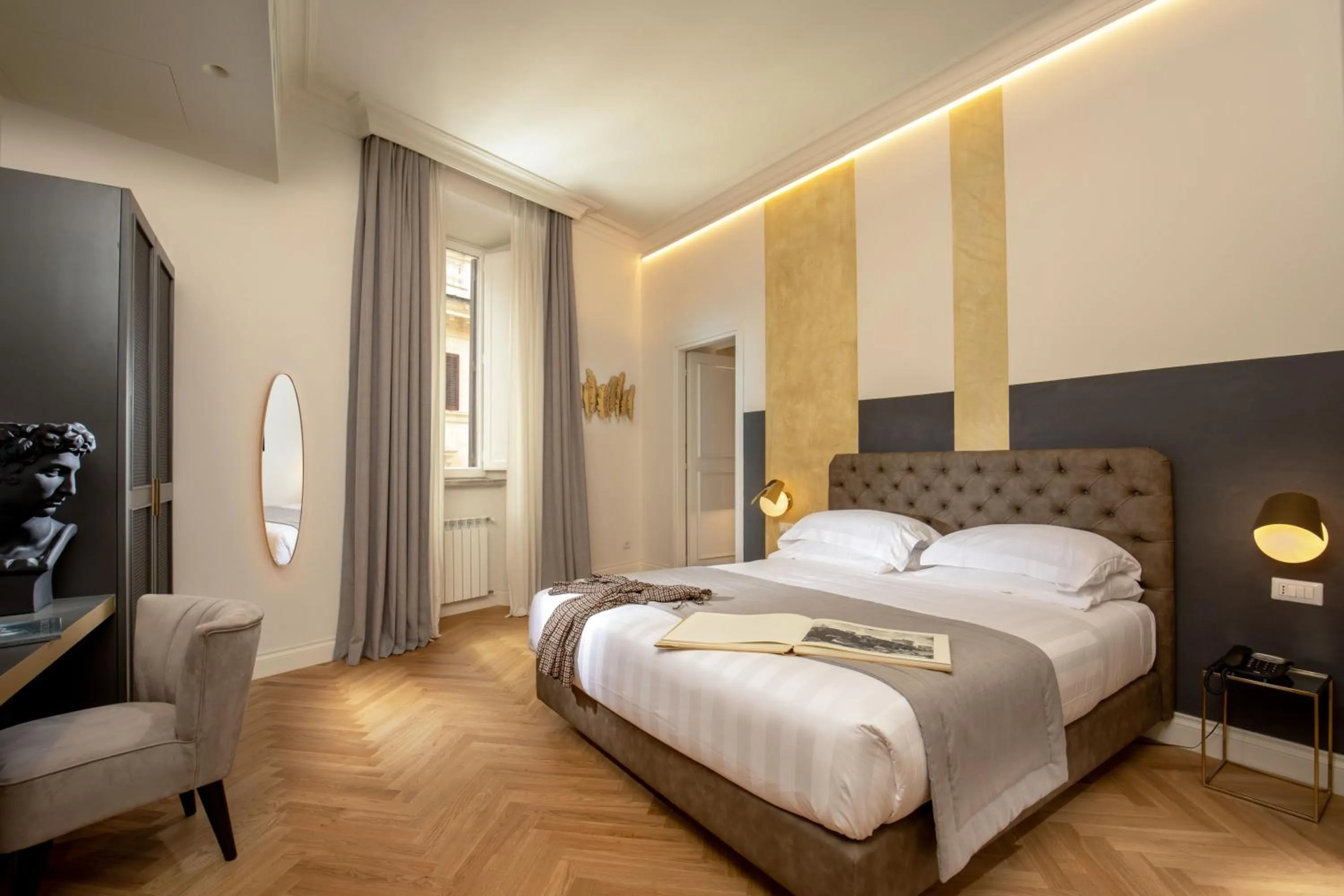 Bed in Spagna Luxury Rooms