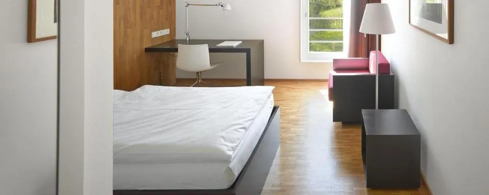 Photo of the whole room, Bed in Evangelische Tagungsstätte Bad Boll