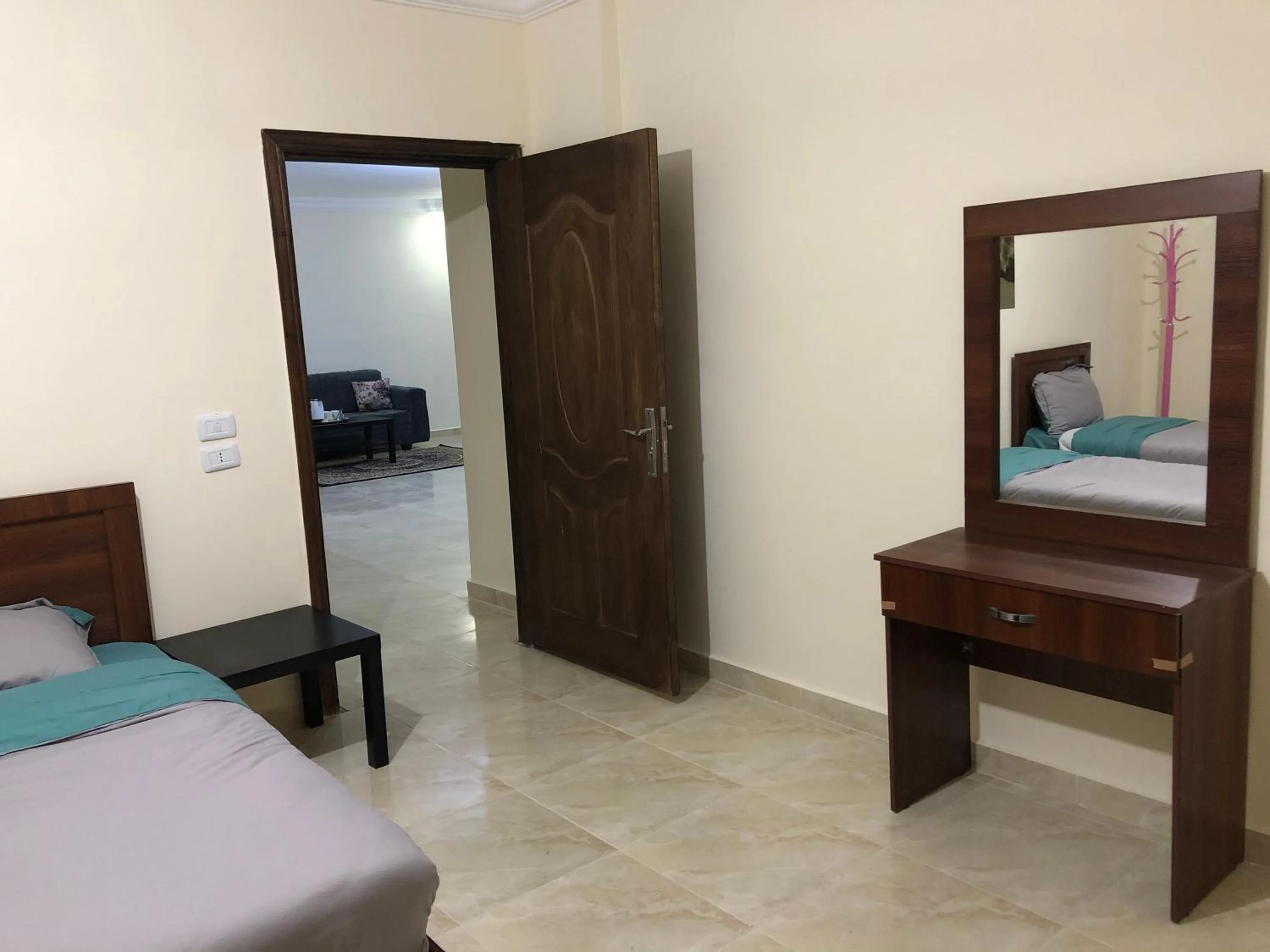 Living room, Bed in Rakan ApartHotel and Luxury Rooms