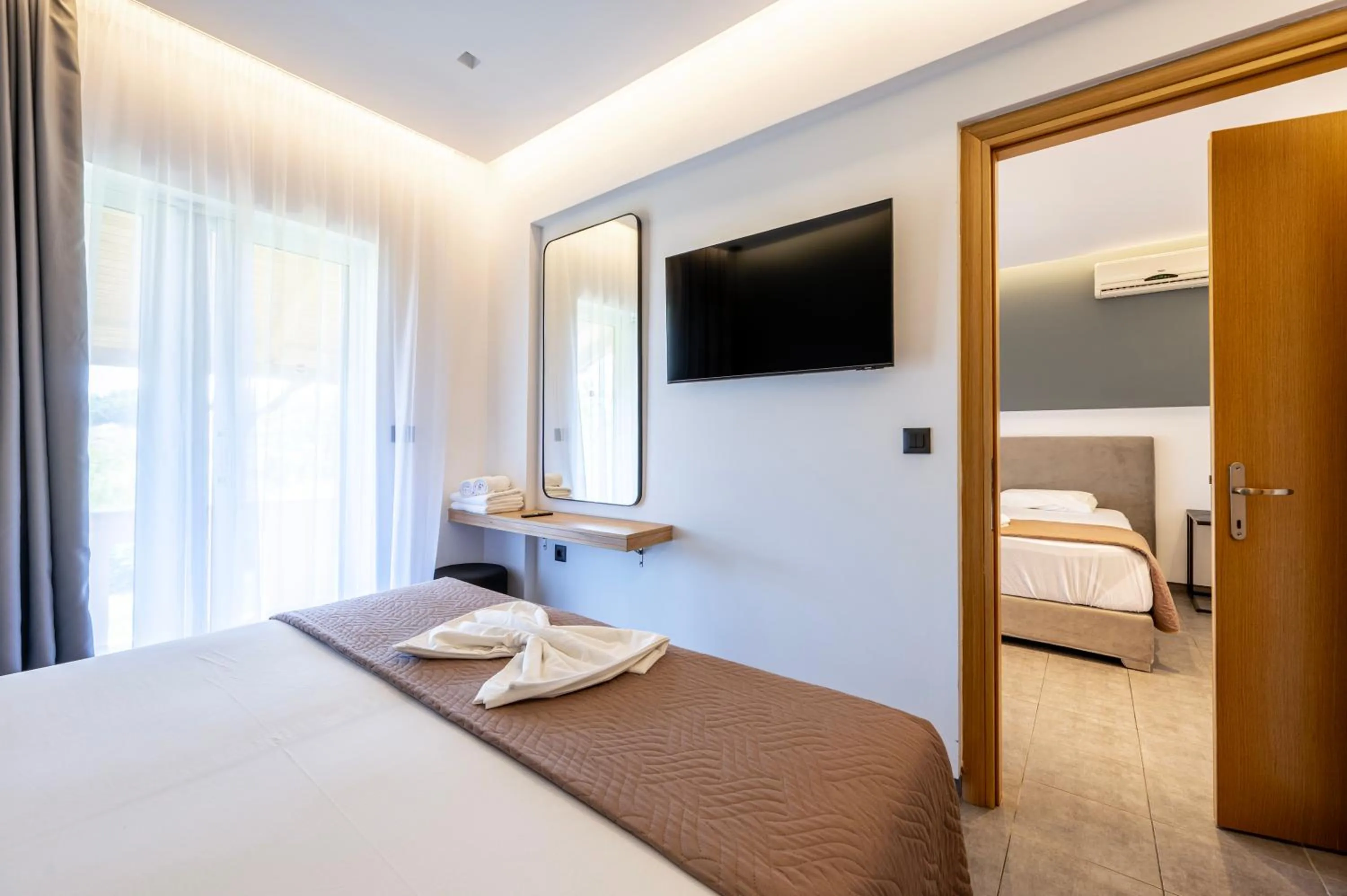 TV and multimedia, Bed in Cirillo Family Hotel-Christinas Studios