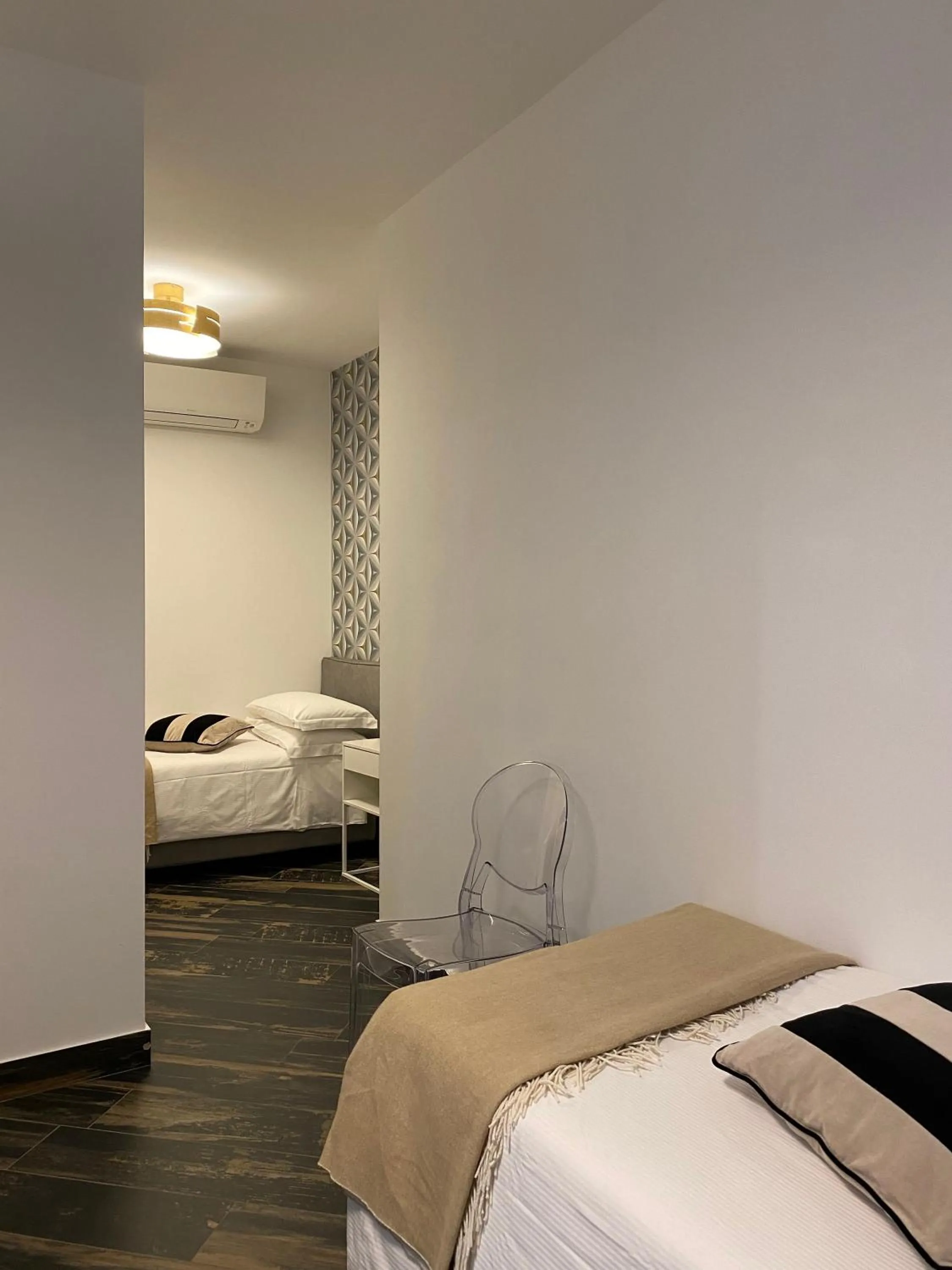 Photo of the whole room, Bed in Gatto Bianco Le Mura