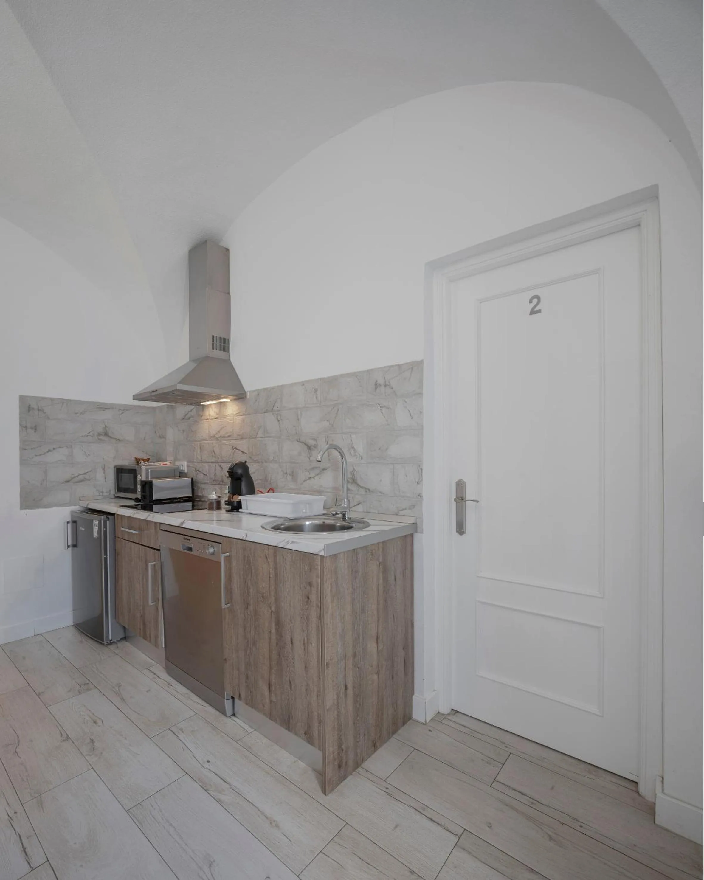Kitchen or kitchenette in Apartamentos Gladiador