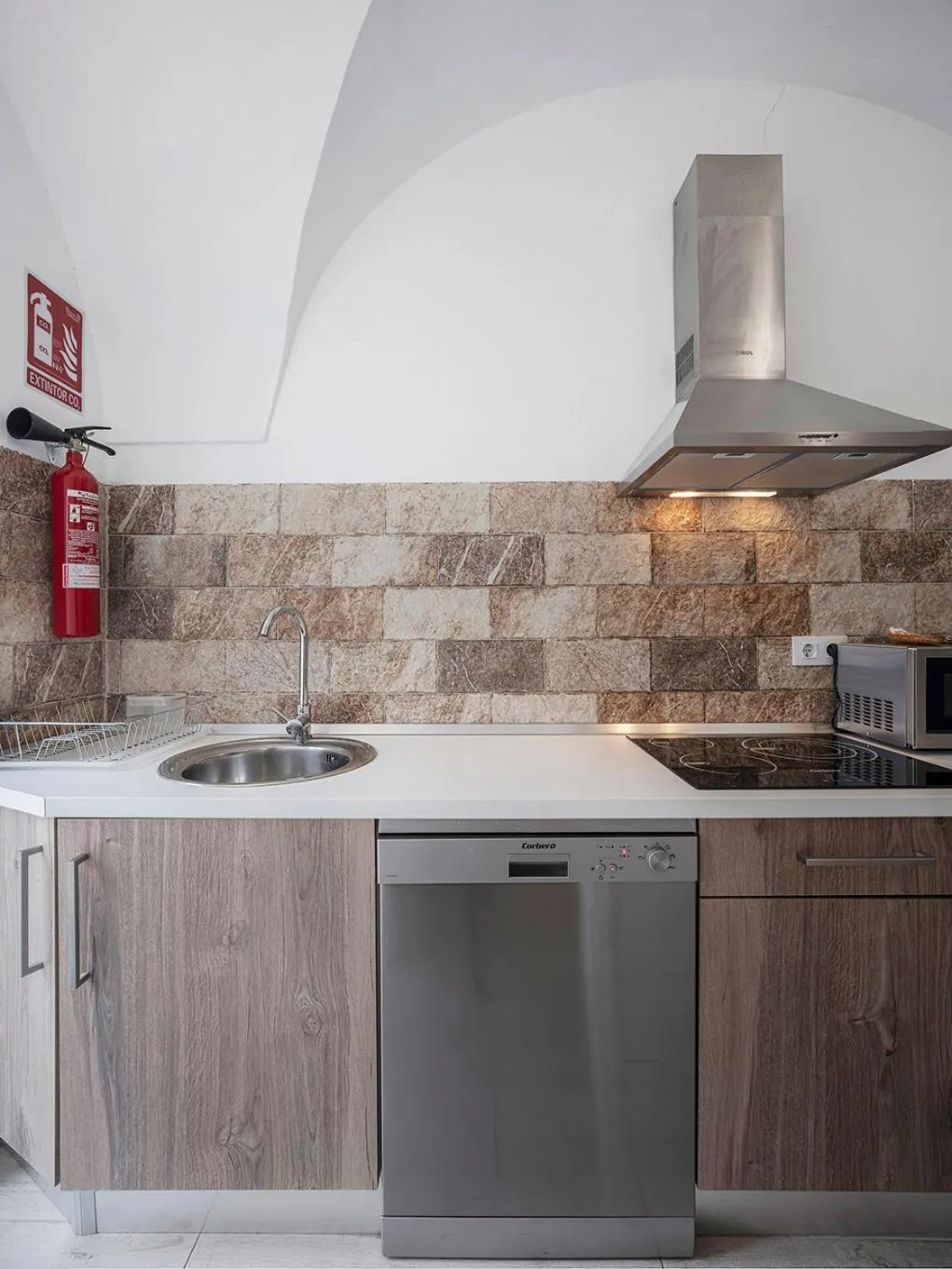 Kitchen or kitchenette in Apartamentos Gladiador