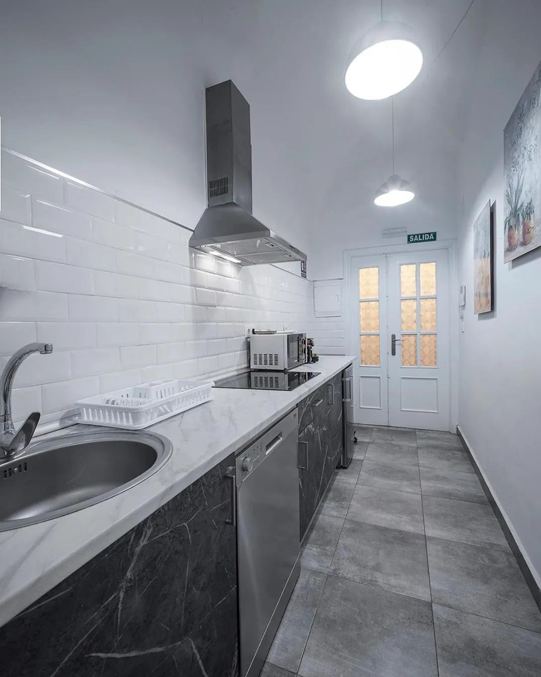 Kitchen or kitchenette in Apartamentos Gladiador