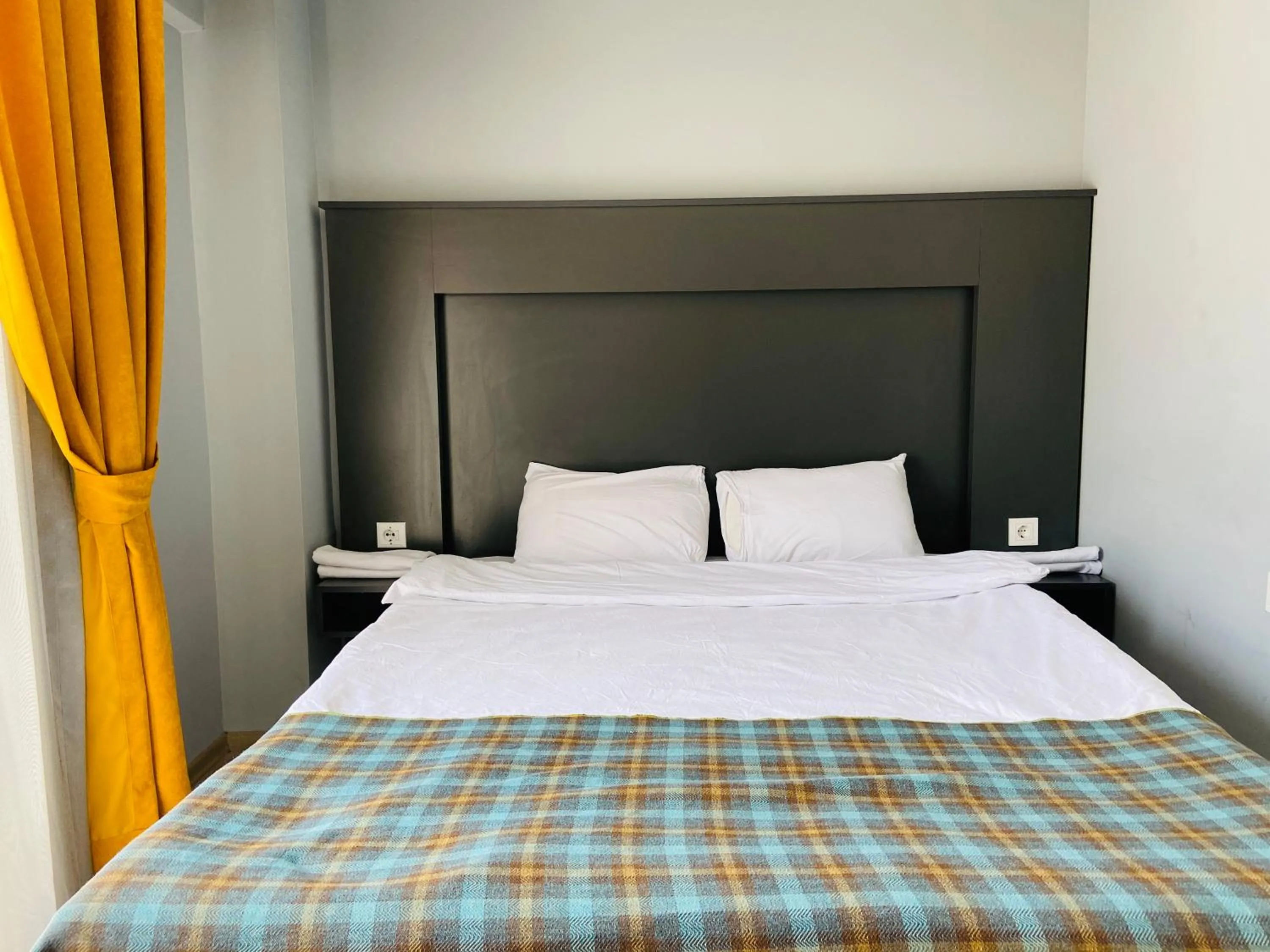 Bed in OTTO LOFT Premium Apartments