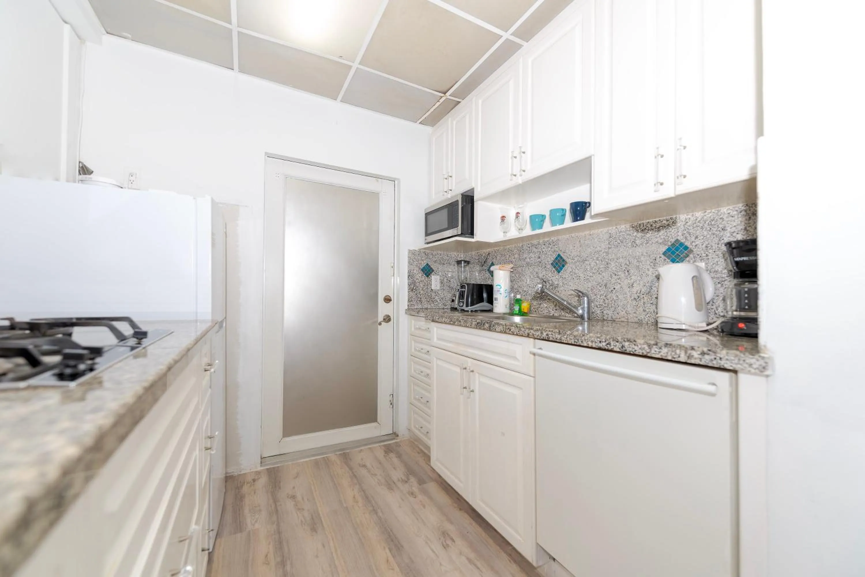 kitchen in Sofi Beach Apartments