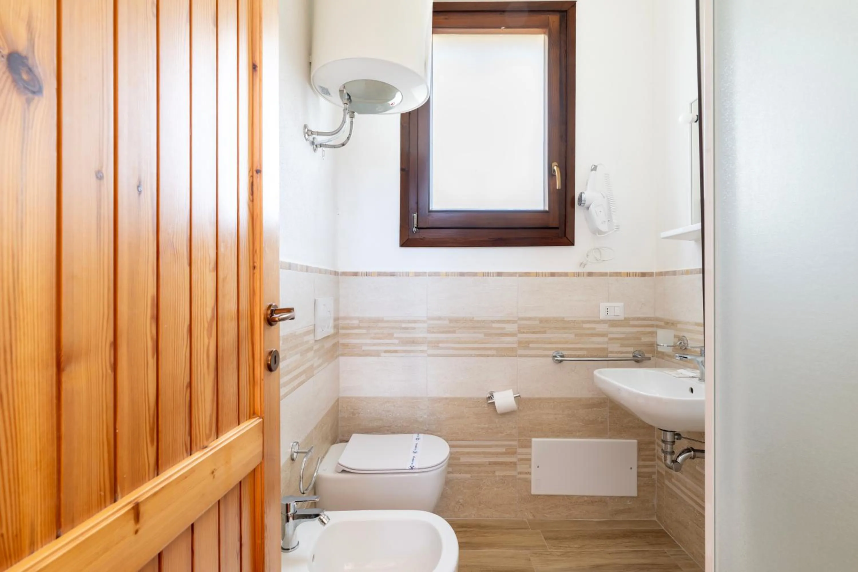 Bathroom in Residence Baia Santa Reparata