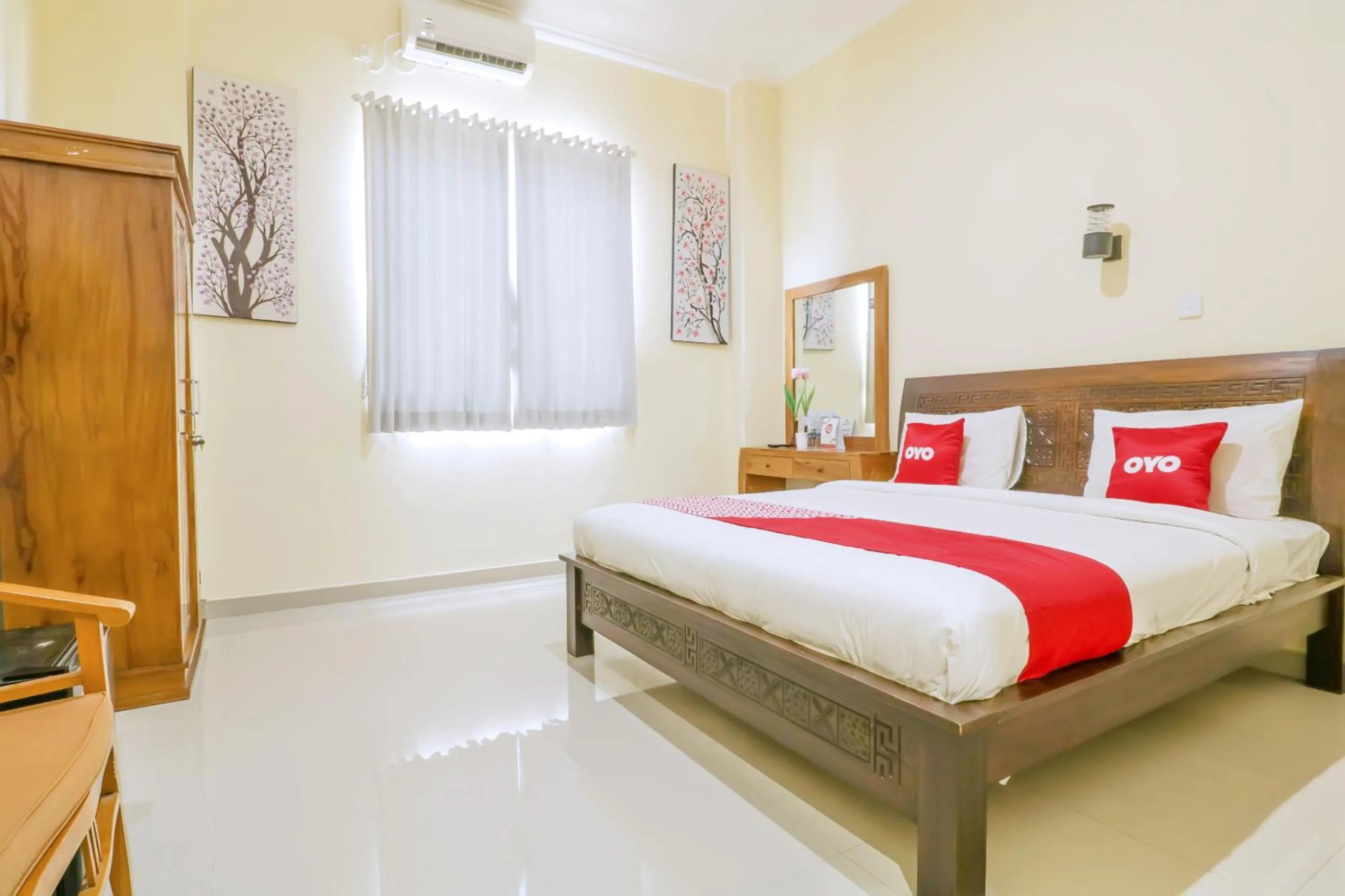 Bedroom in OYO 1684 Marina Suite Apartment Bali