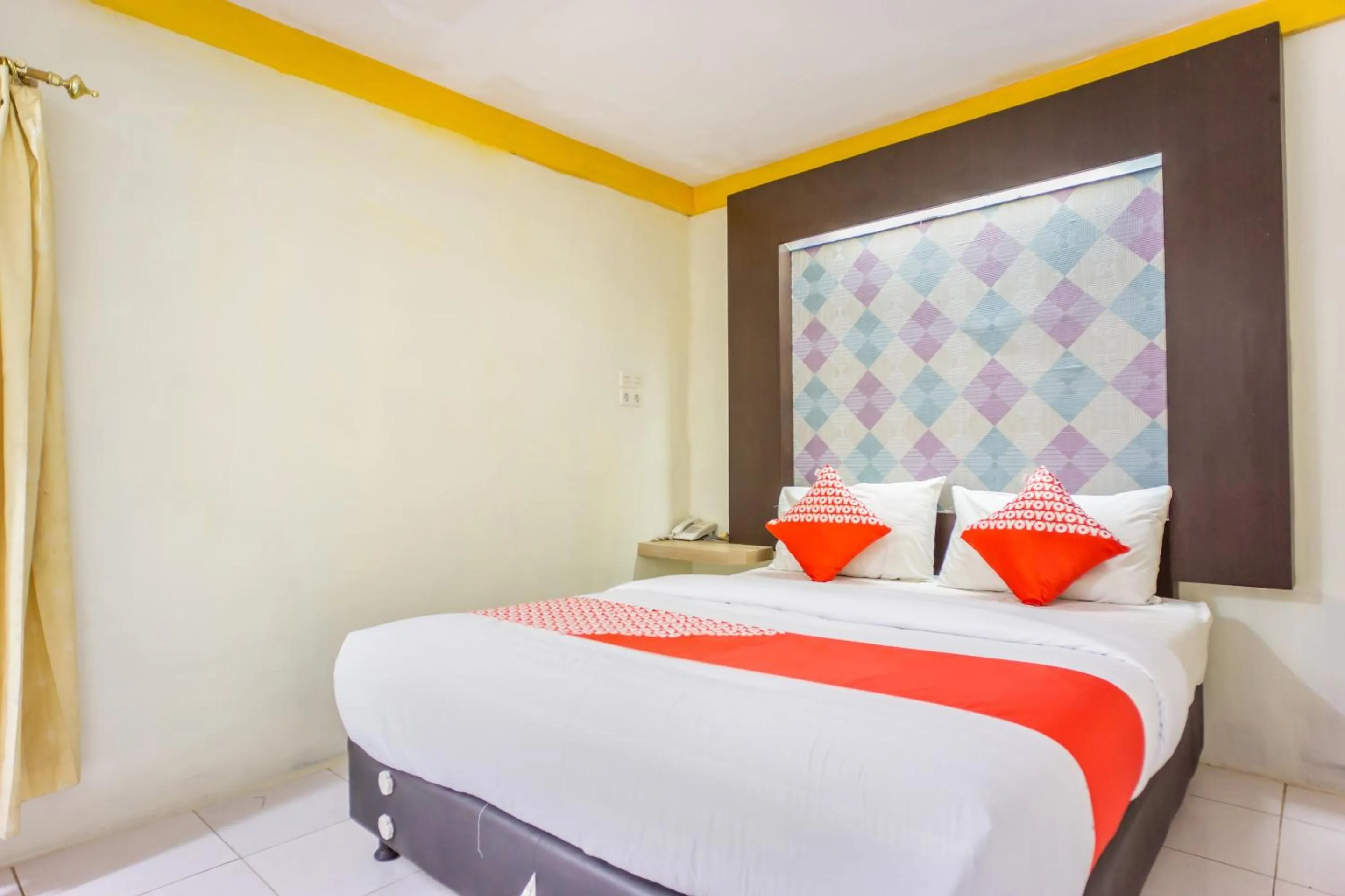 Bedroom, Bed in Hotel O Wisma Kuta Karang