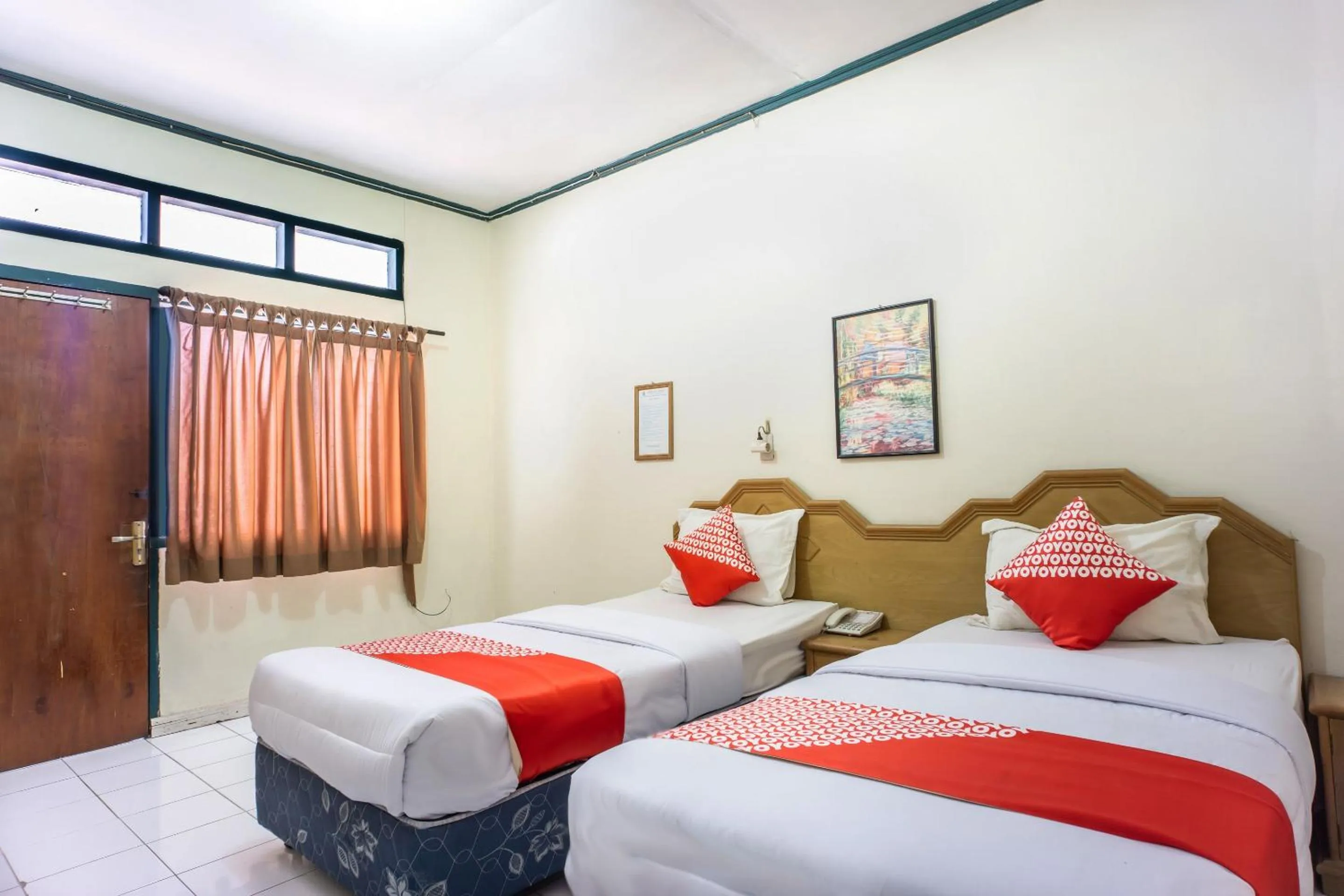 Bedroom, Bed in Hotel O Wisma Kuta Karang