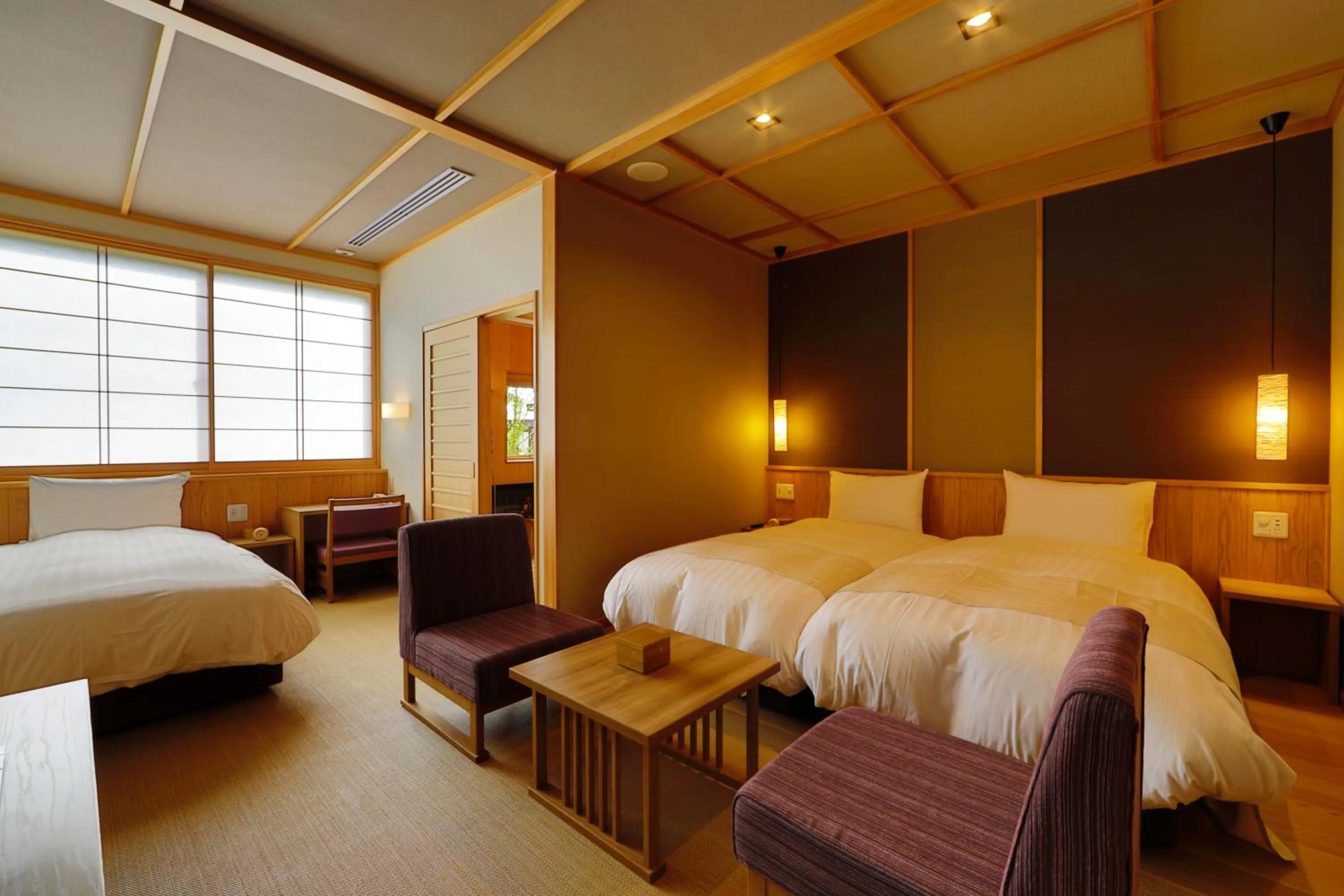 Bed in Yukemuri no Yado Inazumi Onsen