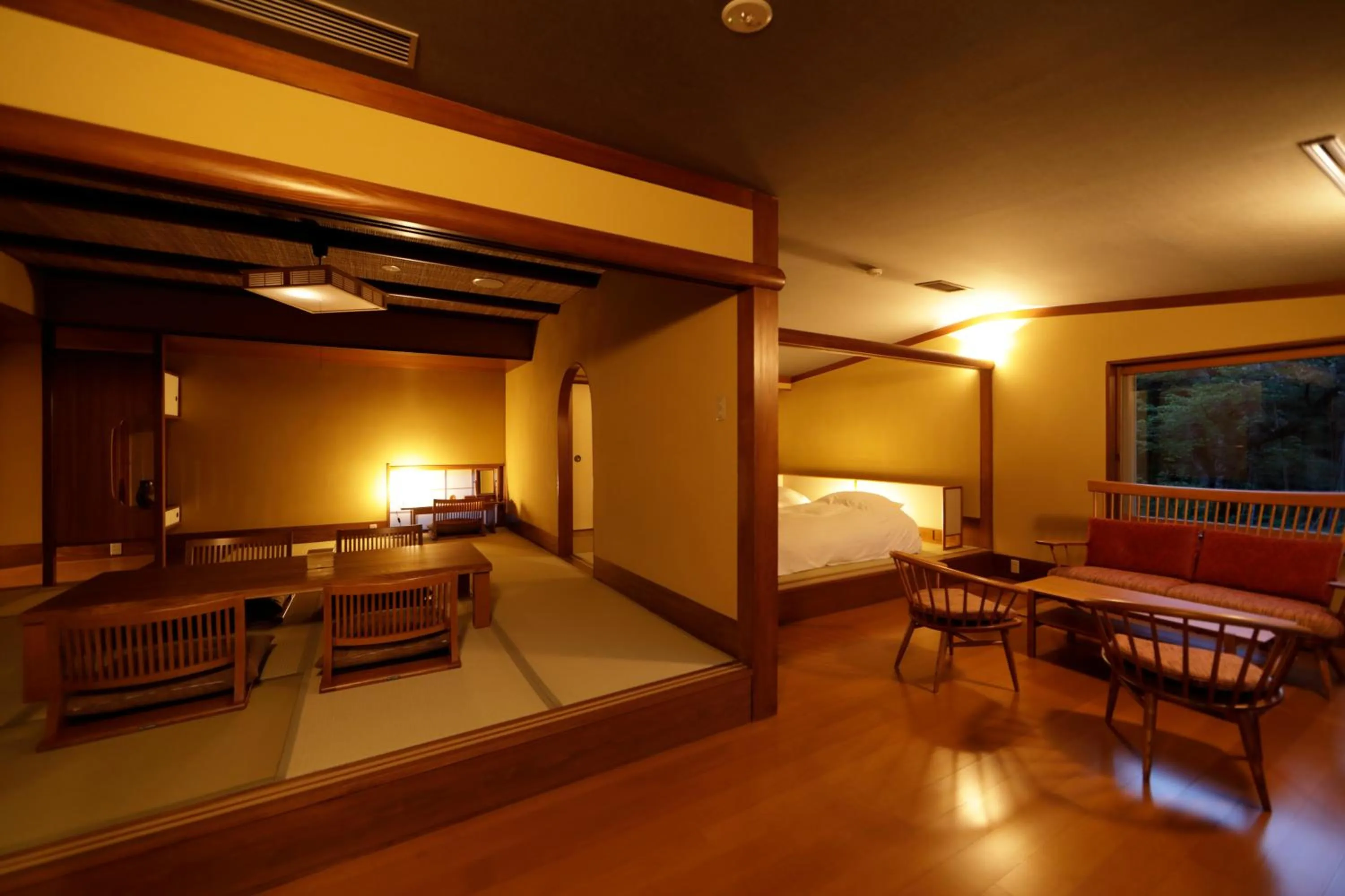 Photo of the whole room, Bed in Yukemuri no Yado Inazumi Onsen