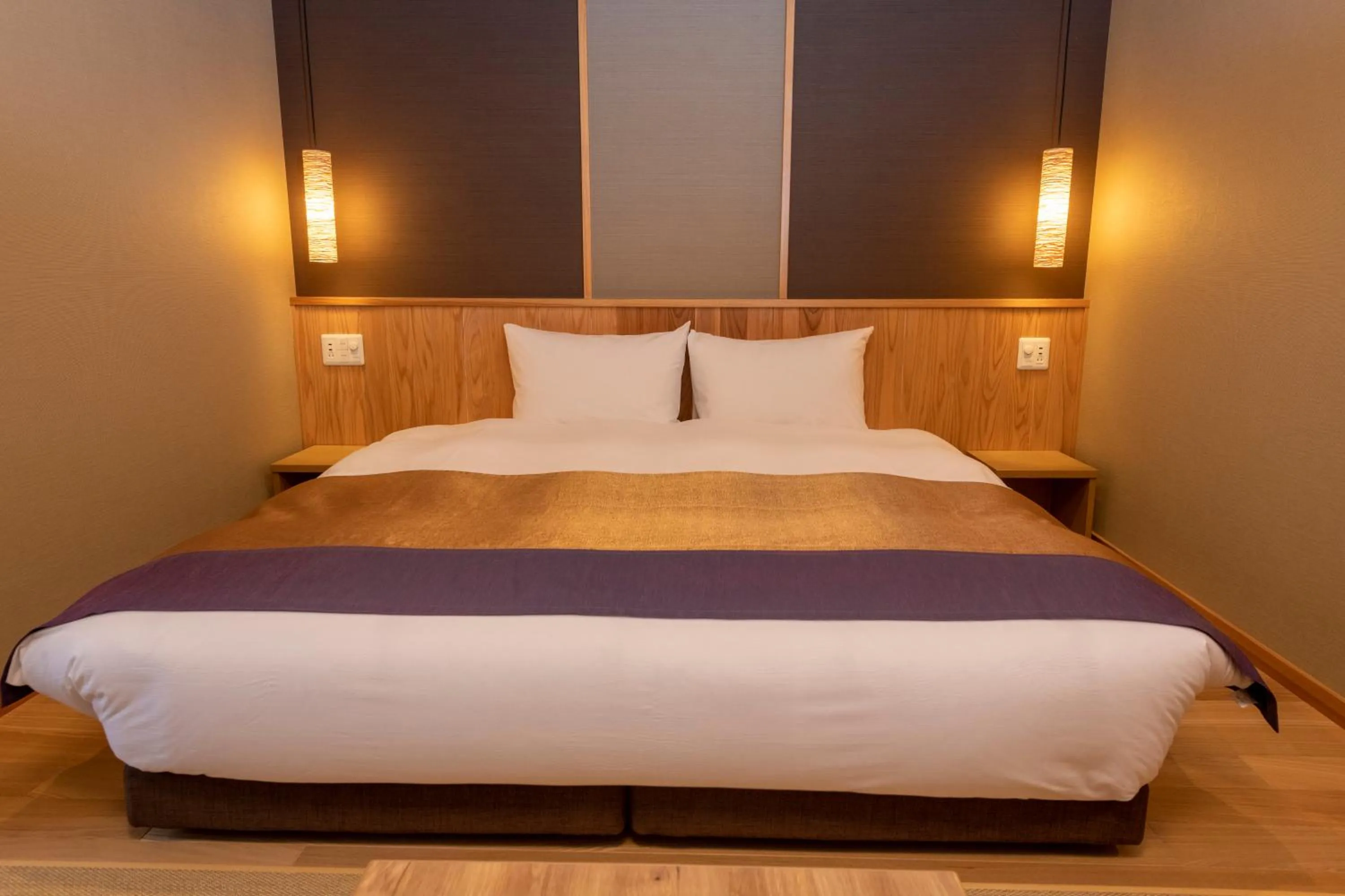 Bed in Yukemuri no Yado Inazumi Onsen